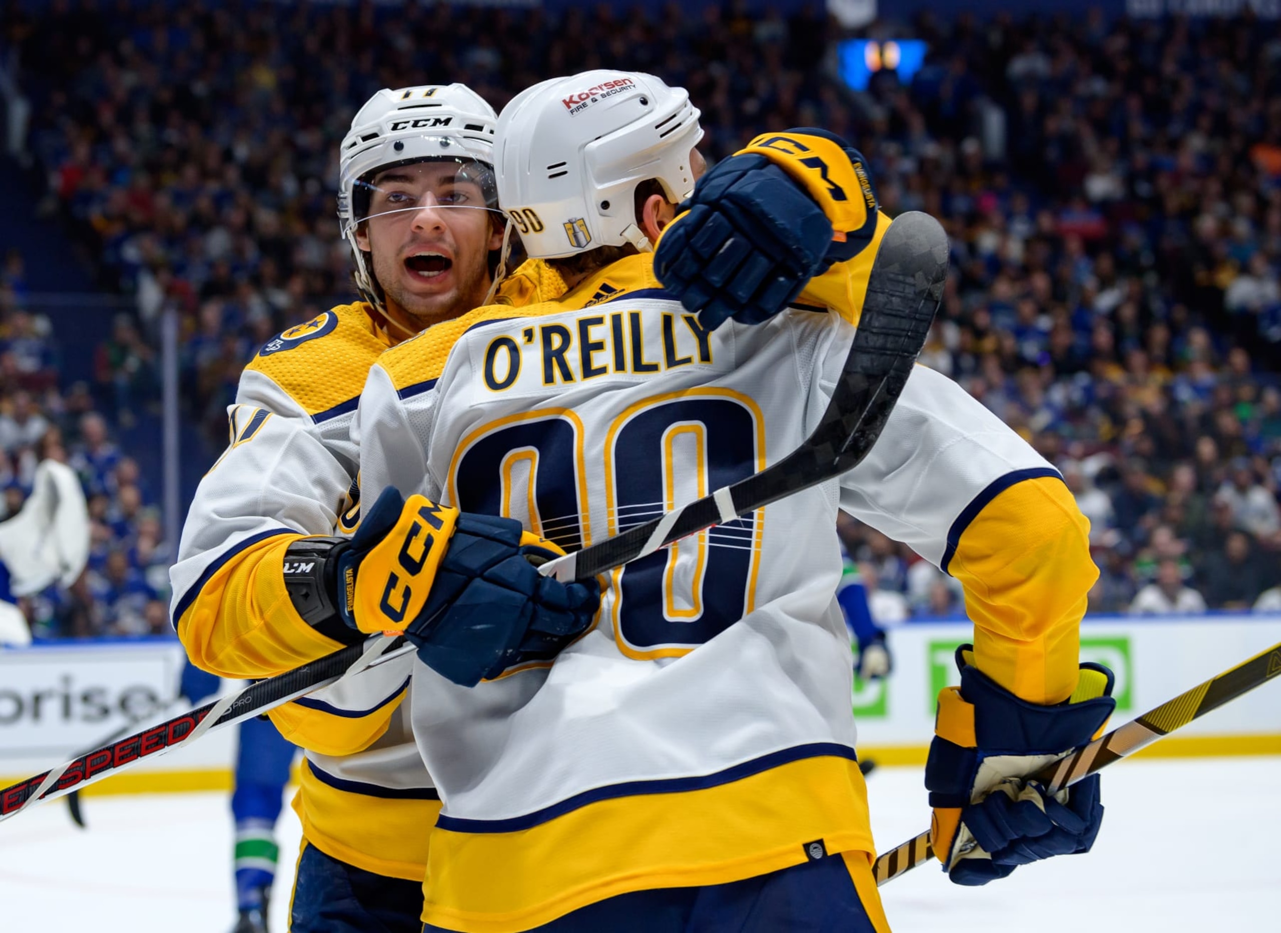 VANCOUVER, CANADA - APRIL 21: Ryan O'Reilly #90 of the Nashville Predators celebrates his second-period goal with Luke Evangelista #77 against the Vancouver Canucks of Game One of the First Round of the 2024 Stanley Cup Playoffs at Rogers Arena on April 21, 2024 in Vancouver, British Columbia, Canada. (Photo by Derek Cain/Getty Images)