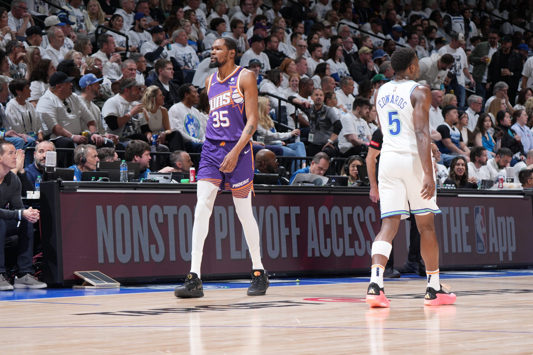 MINNEAPOLIS, MN -  APRIL 23: Anthony Edwards #5 of the Minnesota Timberwolves and Kevin Durant #35 of the Phoenix Suns look on during the game during Round One Game Two of the 2024 NBA Playoffs on April 23, 2024 at Target Center in Minneapolis, Minnesota. NOTE TO USER: User expressly acknowledges and agrees that, by downloading and or using this Photograph, user is consenting to the terms and conditions of the Getty Images License Agreement. Mandatory Copyright Notice: Copyright 2024 NBAE (Photo by Jordan Johnson/NBAE via Getty Images)