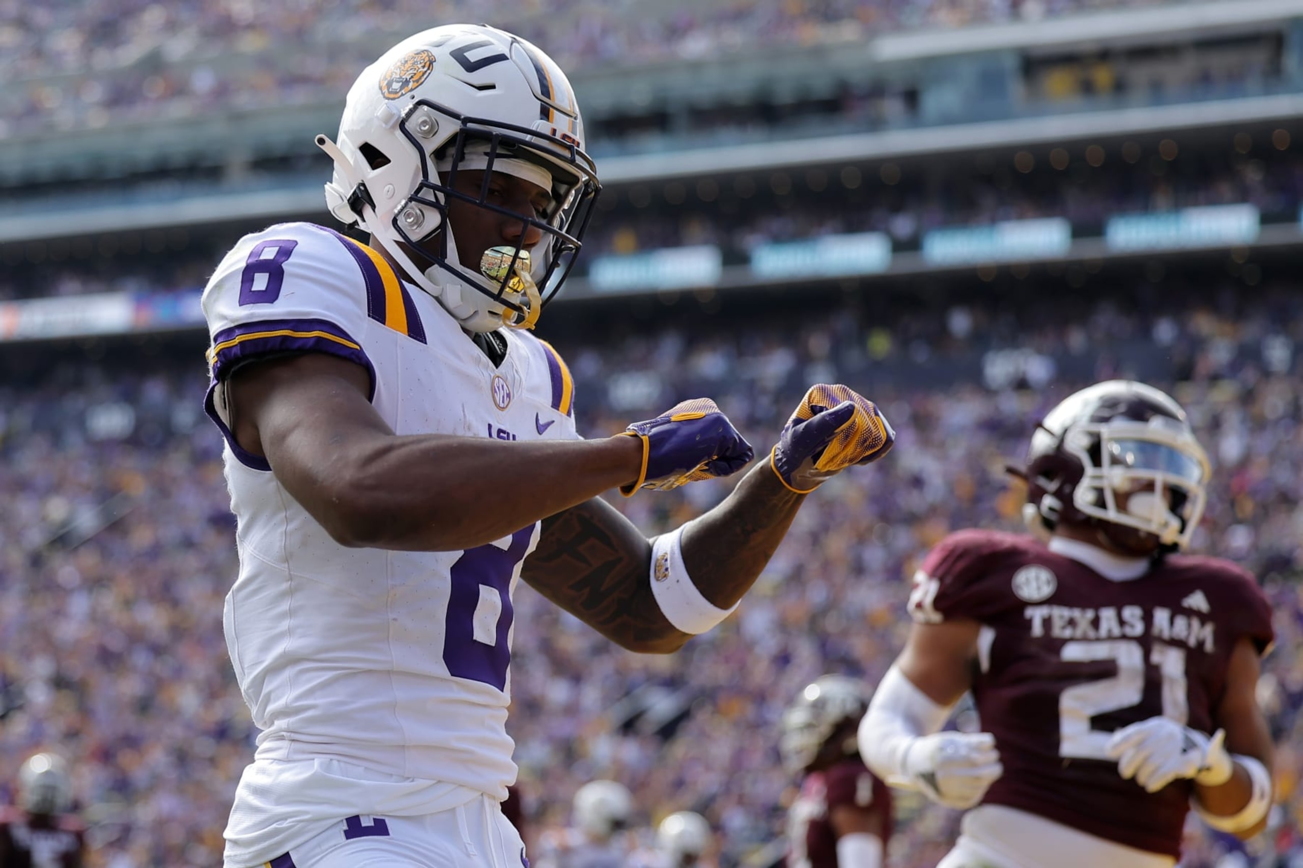 BATON ROUGE, LOUISIANA - NOVEMBER 25: Malik Nabers #8 of the LSU Tigers celebrates a touchdown during the first half against the Texas A&M Aggies at Tiger Stadium on November 25, 2023 in Baton Rouge, Louisiana. (Photo by Jonathan Bachman/Getty Images) BATON ROUGE, LOUISIANA - NOVEMBER 25: Malik Nabers #8 of the LSU Tigers celebrates a touchdown during the first half against the Texas A&M Aggies at Tiger Stadium on November 25, 2023 in Baton Rouge, Louisiana. (Photo by Jonathan Bachman/Getty Images)