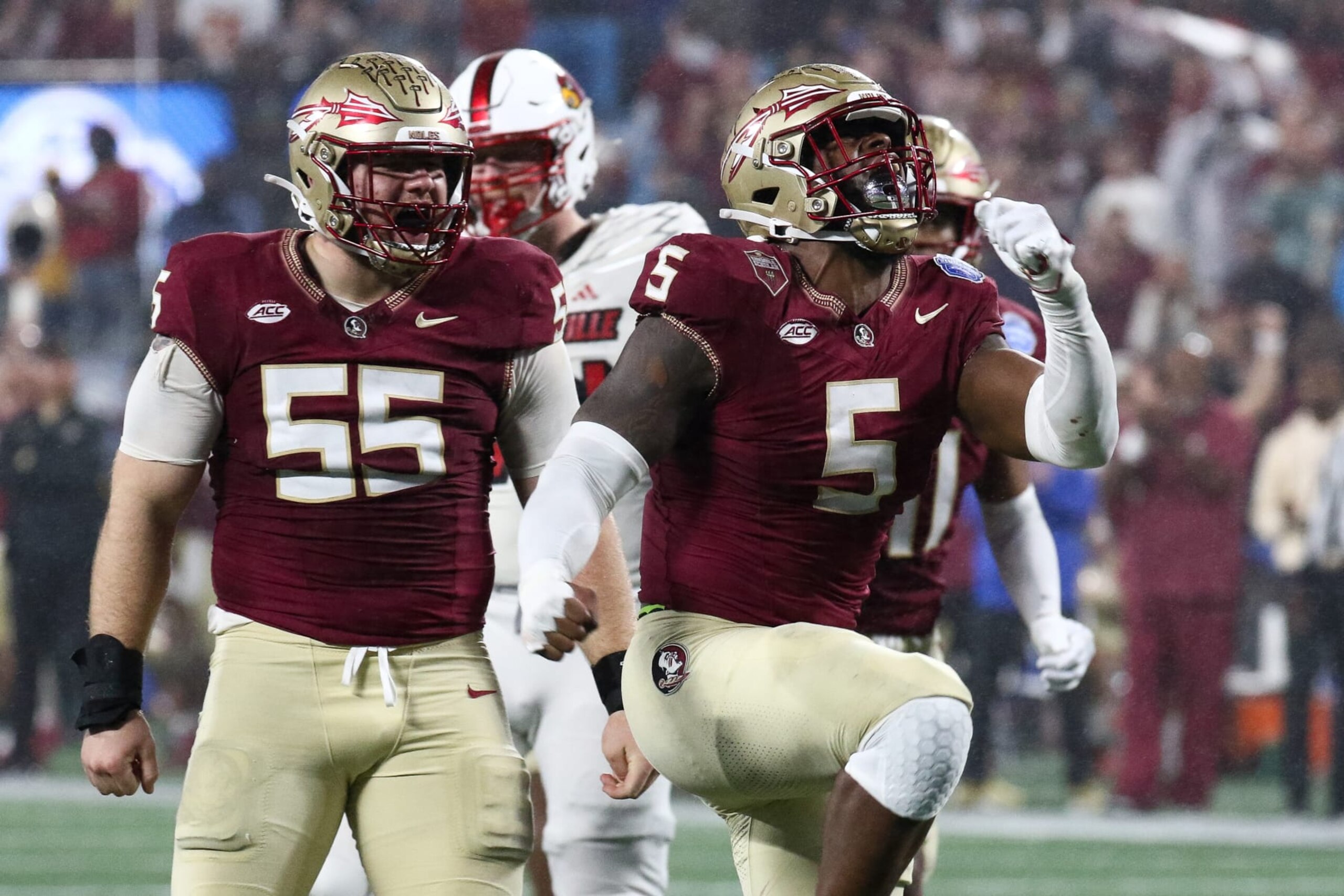 CHARLOTTE, NORTH CAROLINA - DECEMBER 2: Jared Verse #5 of the Florida State Seminoles reacts with Braden Fiske #55 of the Florida State Seminoles after a sack against the Louisville Cardinals during the ACC Championship at Bank of America Stadium on December 2, 2023 in Charlotte, North Carolina. (Photo by Isaiah Vazquez/Getty Images) CHARLOTTE, NORTH CAROLINA - DECEMBER 2: Jared Verse #5 of the Florida State Seminoles reacts with Braden Fiske #55 of the Florida State Seminoles after a sack against the Louisville Cardinals during the ACC Championship at Bank of America Stadium on December 2, 2023 in Charlotte, North Carolina. (Photo by Isaiah Vazquez/Getty Images)