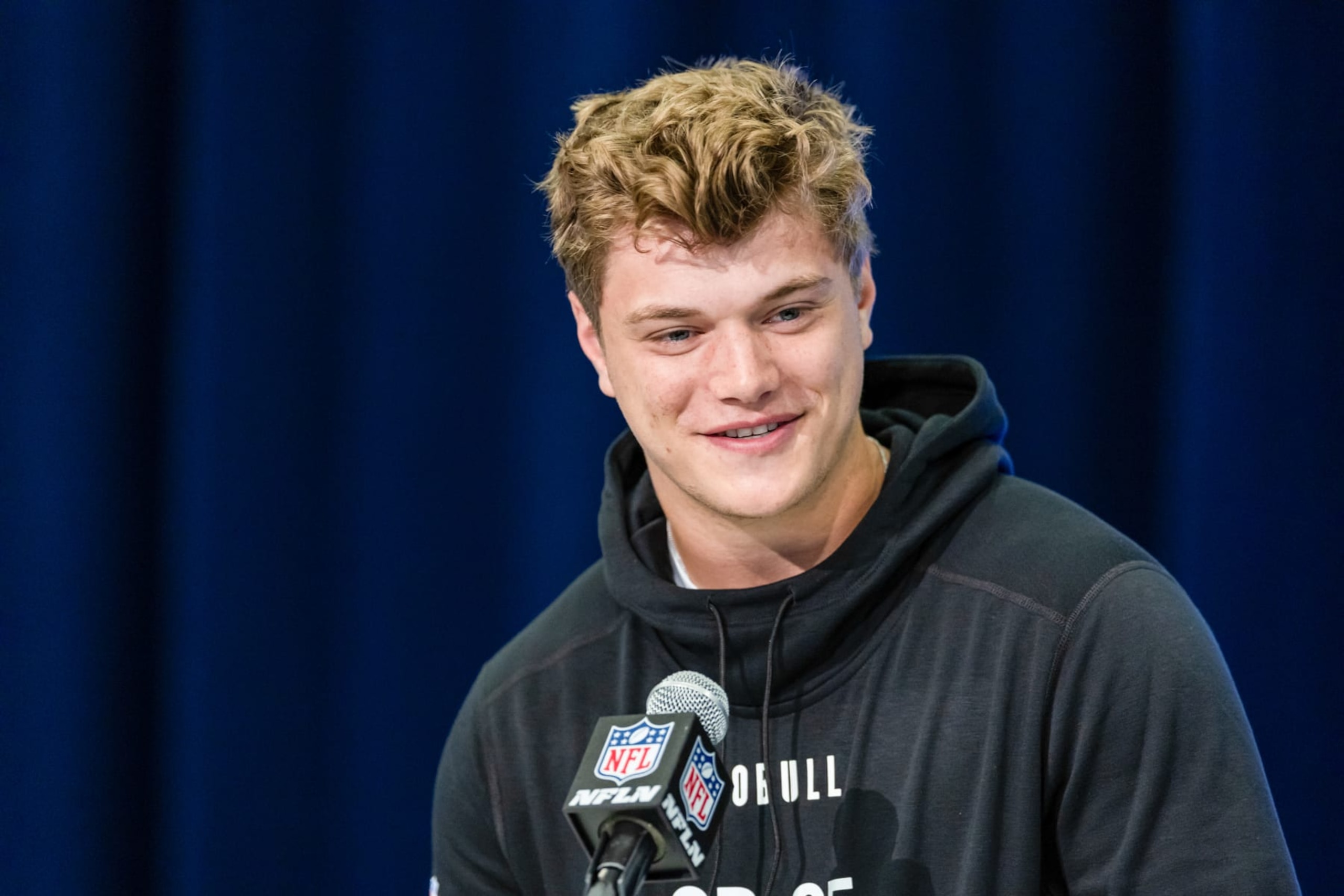 INDIANAPOLIS, INDIANA - MARCH 01: JJ McCarthy #QB05 of the Michigan Wolverines speaks to the media during the 2024 NFL Draft Combine at Lucas Oil Stadium on March 01, 2024 in Indianapolis, Indiana. (Photo by Michael Hickey/Getty Images)