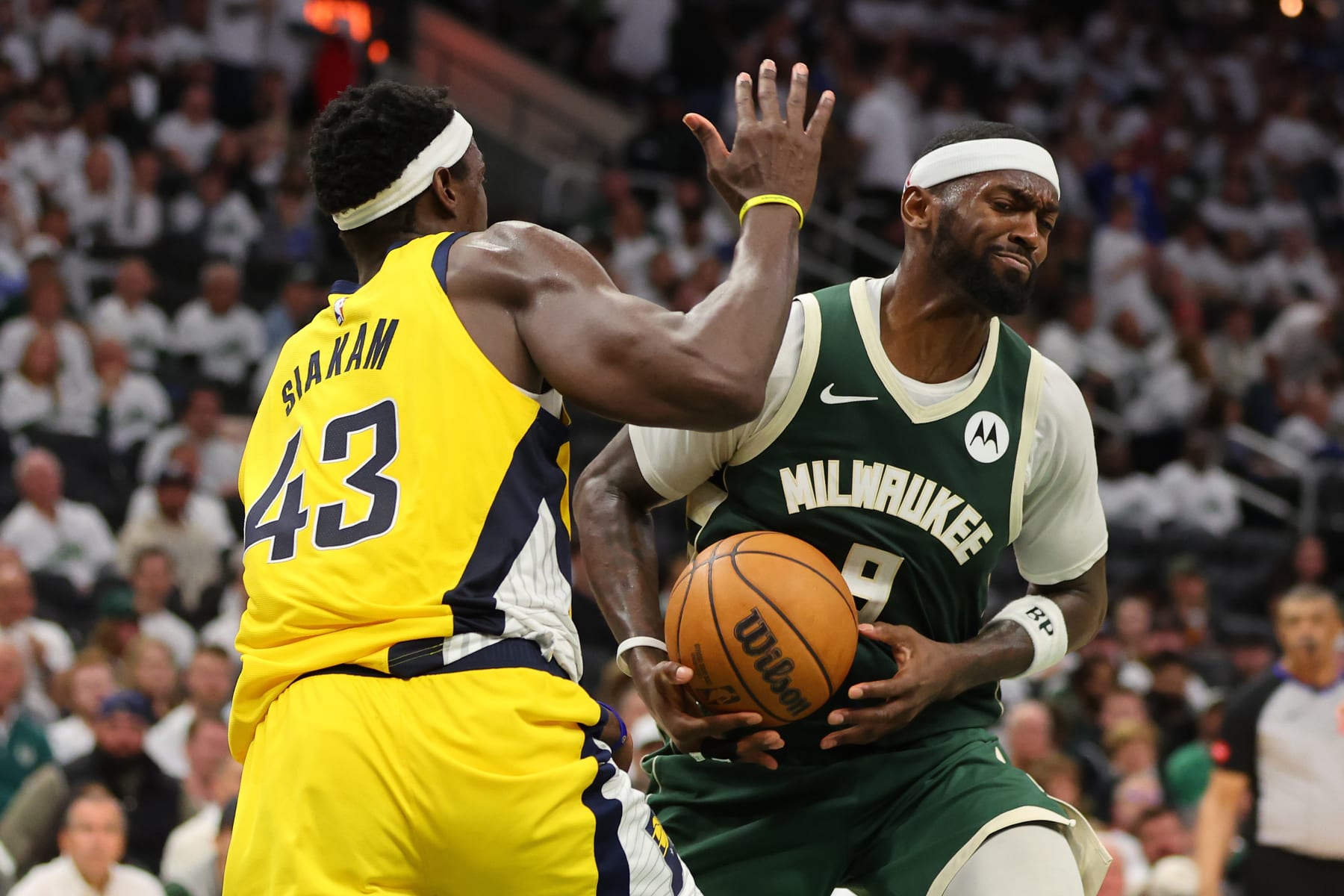 MILWAUKEE, WISCONSIN - APRIL 23: Bobby Portis #9 of the Milwaukee Bucks is defended by Pascal Siakam #43 of the Indiana Pacers during the second half of game two of the Eastern Conference First Round Playoffs at Fiserv Forum on April 23, 2024 in Milwaukee, Wisconsin. NOTE TO USER: User expressly acknowledges and agrees that, by downloading and or using this photograph, User is consenting to the terms and conditions of the Getty Images License Agreement. (Photo by Stacy Revere/Getty Images)