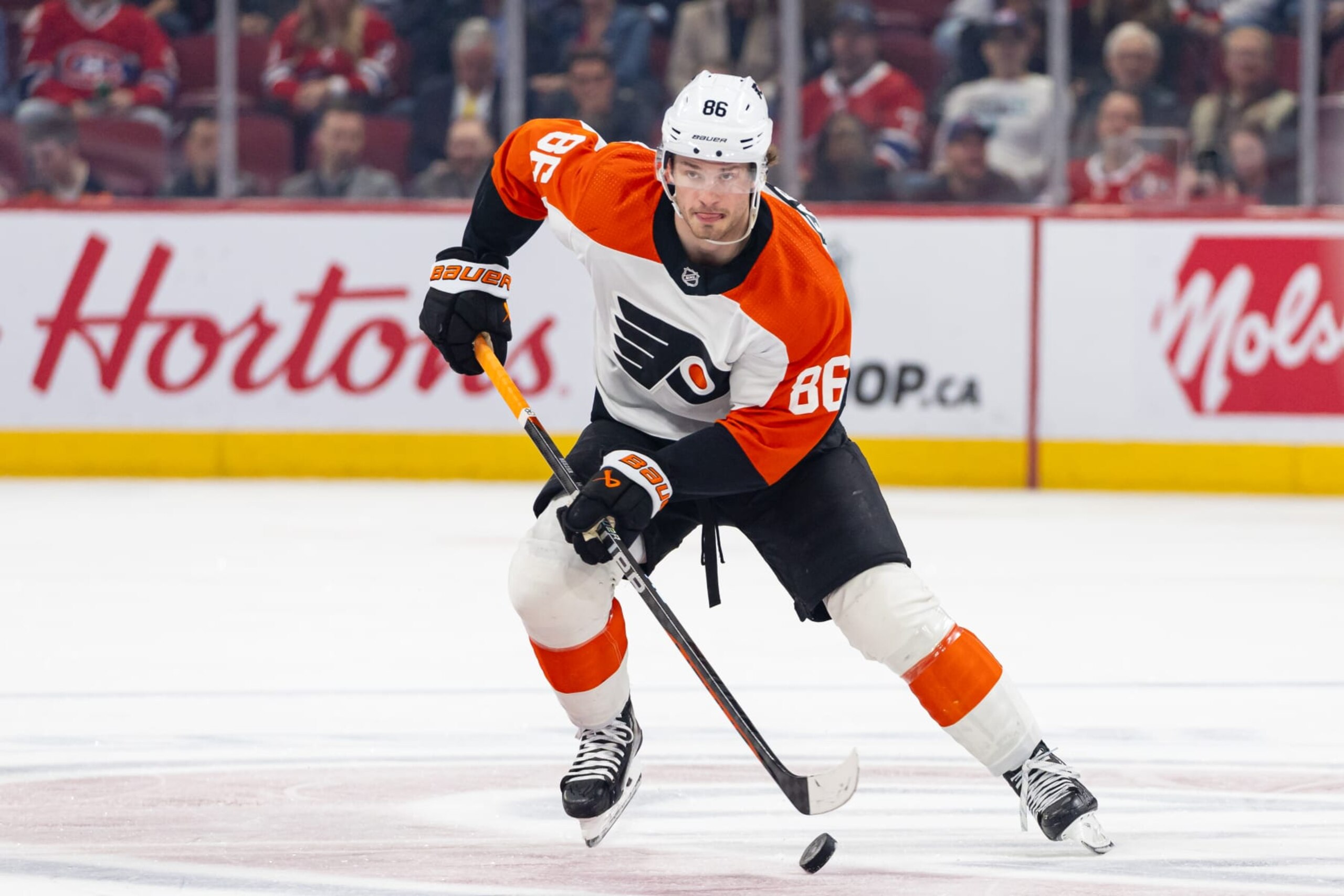 MONTREAL, CANADA - APRIL 9: Joel Farabee #86 of the Philadelphia Flyers crosses centre ice with the puck during the third period of the NHL regular season game against the Montreal Canadiens at the Bell Centre on April 9, 2024 in Montreal, Quebec, Canada. The Montreal Canadiens defeated the Philadelphia Flyers by a score of 9-3. (Photo by Vitor Munhoz/NHLI via Getty Images)