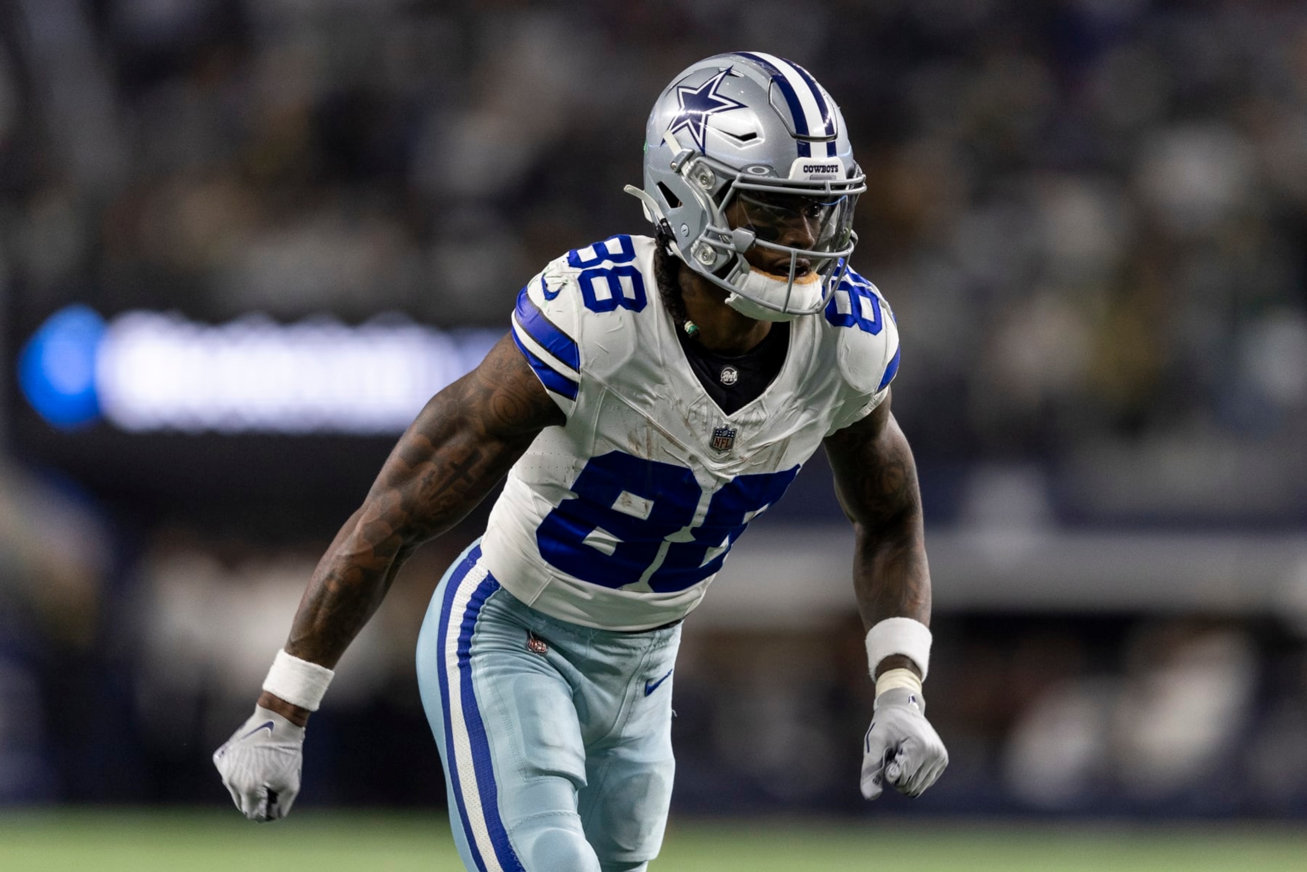 ARLINGTON, TEXAS - JANUARY 14: CeeDee Lamb #88 of the Dallas Cowboys runs a route during an NFL wild-card playoff football game between the Dallas Cowboys and the Green Bay Packers at AT&T Stadium on January 14, 2024 in Arlington, Texas. (Photo by Michael Owens/Getty Images) ARLINGTON, TEXAS - JANUARY 14: CeeDee Lamb #88 of the Dallas Cowboys runs a route during an NFL wild-card playoff football game between the Dallas Cowboys and the Green Bay Packers at AT&T Stadium on January 14, 2024 in Arlington, Texas. (Photo by Michael Owens/Getty Images)