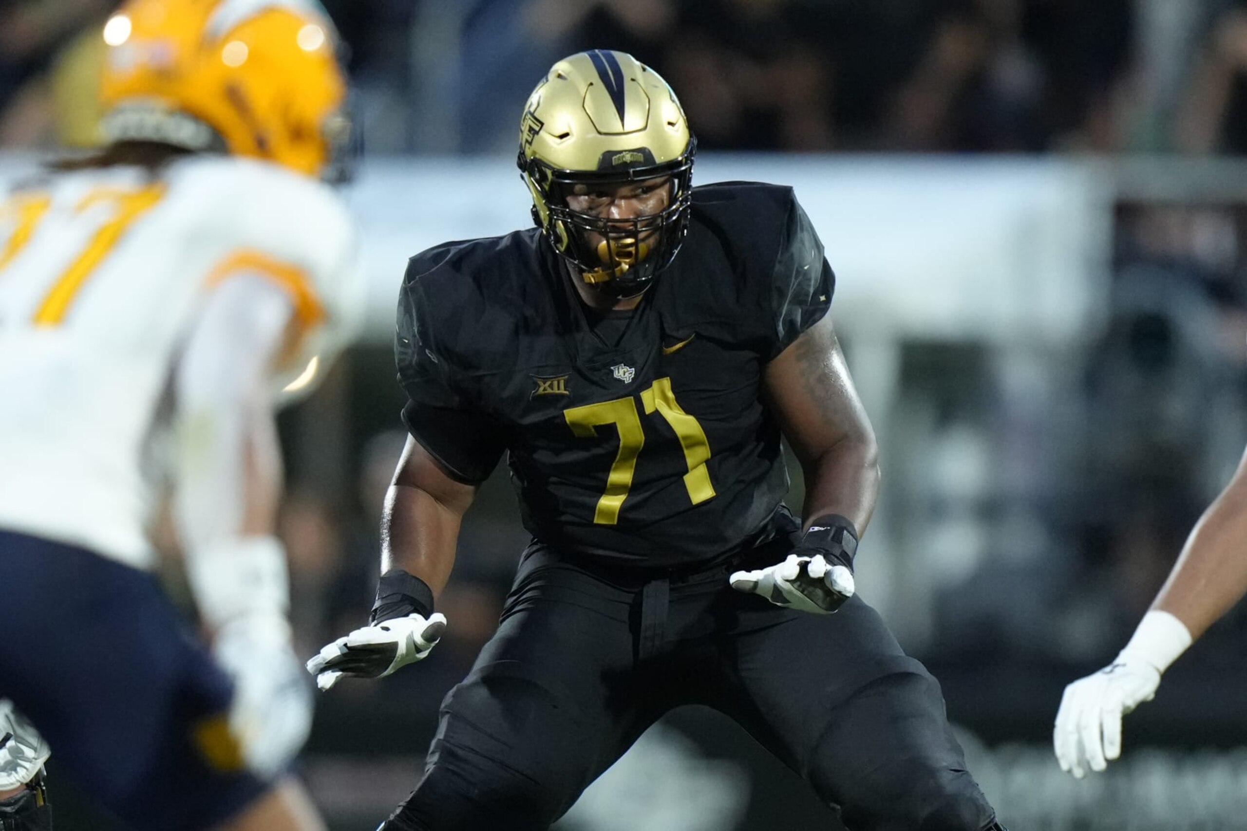 ORLANDO, FL - AUGUST 31: UCF Knights offensive lineman Tylan Grable (71) looks to make a block during the game between the Kent State Golden Flashes and the UCF Knights on Thursday, August 31, 2023 at FBC Mortgage Stadium, Orlando Fla. (Photo by Peter Joneleit/Icon Sportswire via Getty Images)