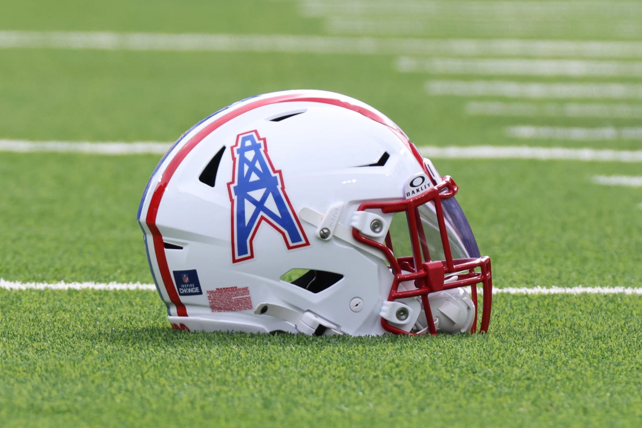 NASHVILLE, TN - DECEMBER 17:  A Houston Oilers throwback helmet sits on the field during a game between the Tennessee Titans and Houston Texans, December 17, 2023 at Nissan Stadium in Nashville, Tennessee. (Photo by Matthew Maxey/Icon Sportswire via Getty Images)