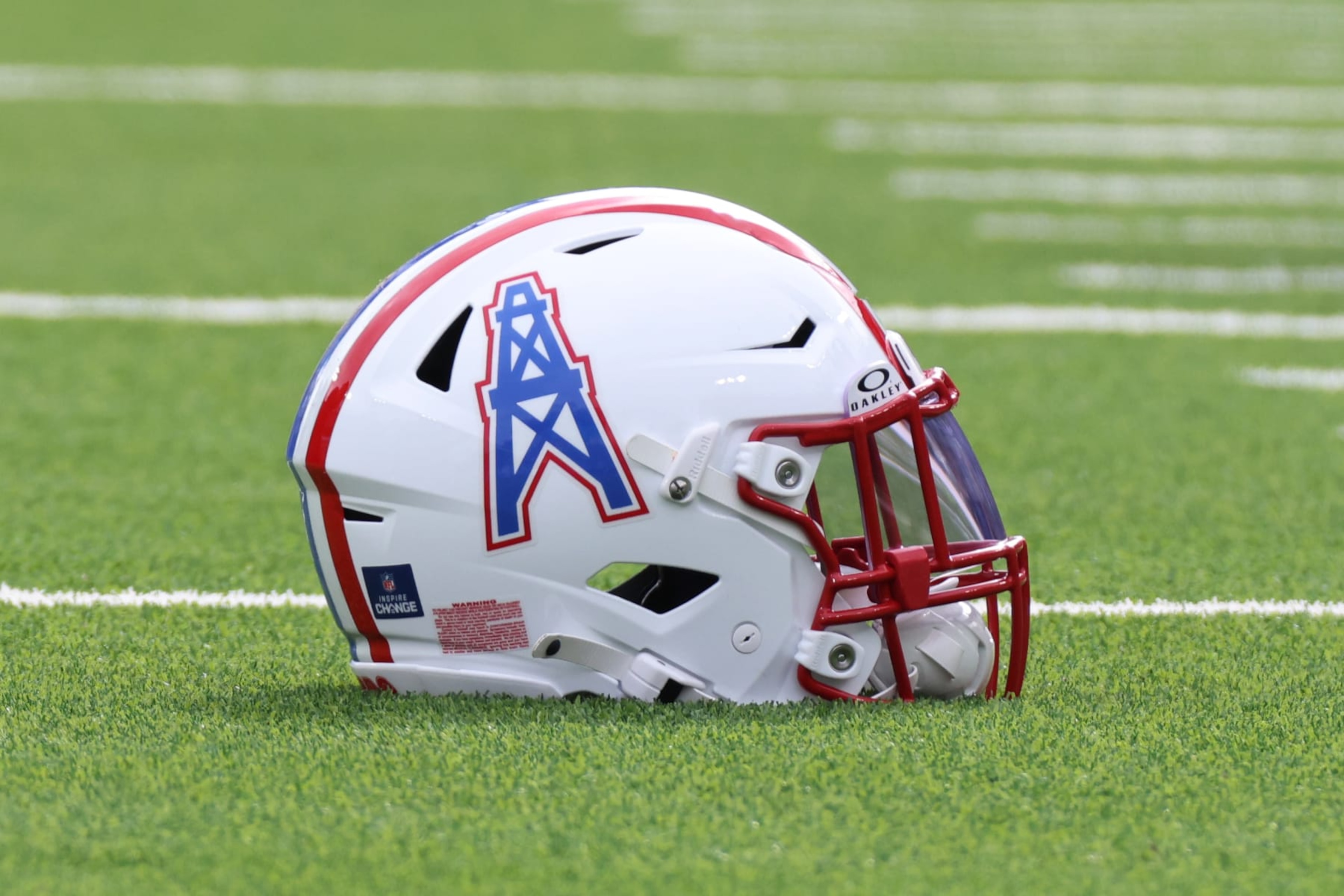 NASHVILLE, TN - DECEMBER 17: A Houston Oilers throwback helmet sits on the field during a game between the Tennessee Titans and Houston Texans, December 17, 2023 at Nissan Stadium in Nashville, Tennessee. (Photo by Matthew Maxey/Icon Sportswire via Getty Images) NASHVILLE, TN - DECEMBER 17: A Houston Oilers throwback helmet sits on the field during a game between the Tennessee Titans and Houston Texans, December 17, 2023 at Nissan Stadium in Nashville, Tennessee. (Photo by Matthew Maxey/Icon Sportswire via Getty Images)