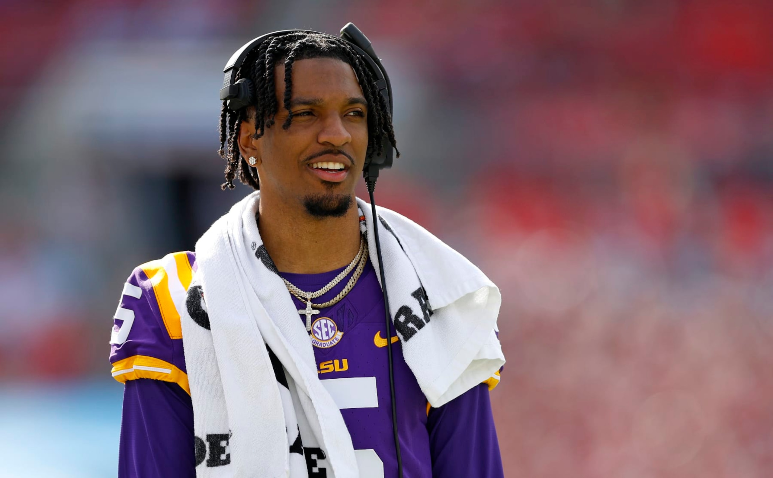 TAMPA, FLORIDA - JANUARY 01: Jayden Daniels #5 of the LSU Tigers looks on during the ReliaQuest Bowl against the Wisconsin Badgers at Raymond James Stadium on January 01, 2024 in Tampa, Florida. (Photo by Mike Ehrmann/Getty Images) TAMPA, FLORIDA - JANUARY 01: Jayden Daniels #5 of the LSU Tigers looks on during the ReliaQuest Bowl against the Wisconsin Badgers at Raymond James Stadium on January 01, 2024 in Tampa, Florida. (Photo by Mike Ehrmann/Getty Images)