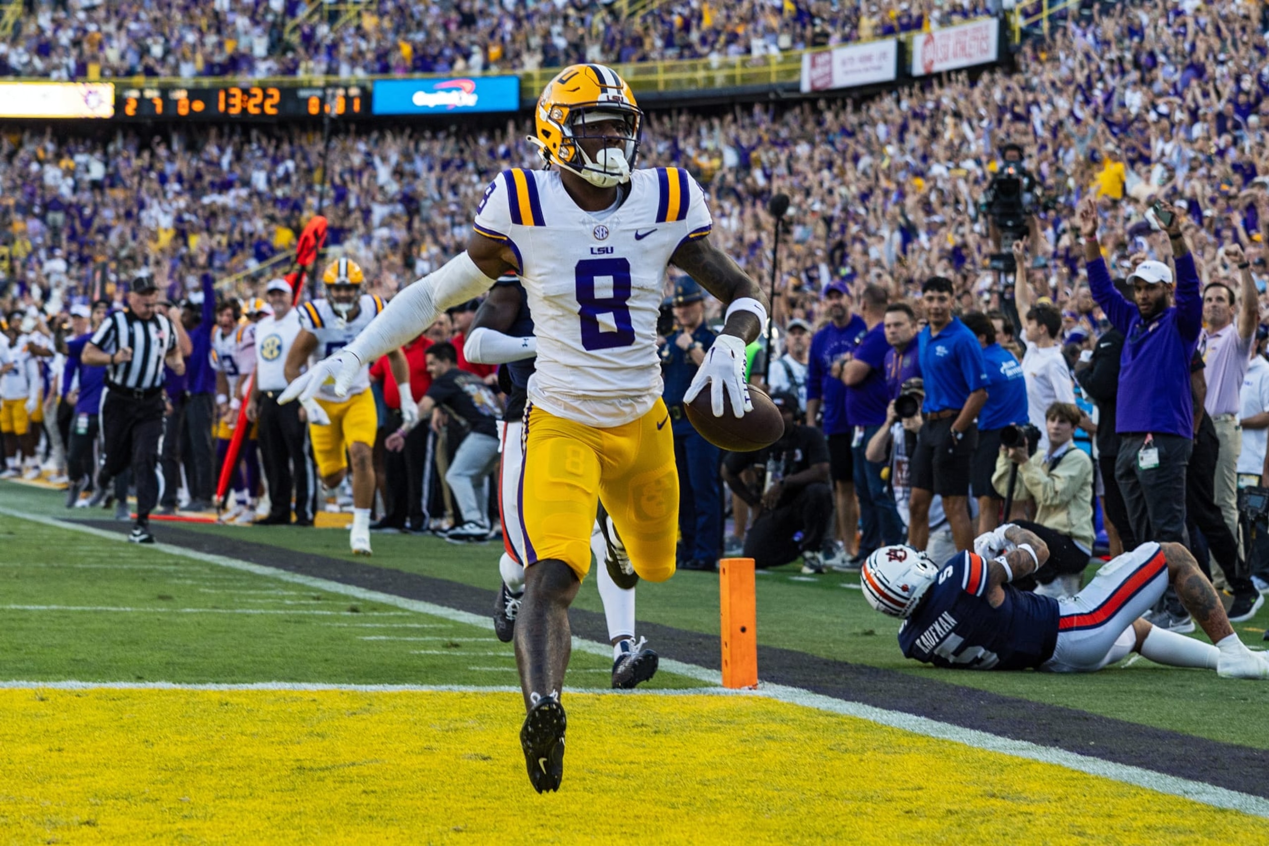BATON ROUGE, LA - OCTOBER 14: LSU Tigers wide receiver Malik Nabers (8) scores a touchdown during a game between the LSU Tigers and the Auburn Tigers on October 14, 2023, at Tiger Stadium in Baton Rouge, Louisiana. (Photo by John Korduner/Icon Sportswire via Getty Images) BATON ROUGE, LA - OCTOBER 14: LSU Tigers wide receiver Malik Nabers (8) scores a touchdown during a game between the LSU Tigers and the Auburn Tigers on October 14, 2023, at Tiger Stadium in Baton Rouge, Louisiana. (Photo by John Korduner/Icon Sportswire via Getty Images)
