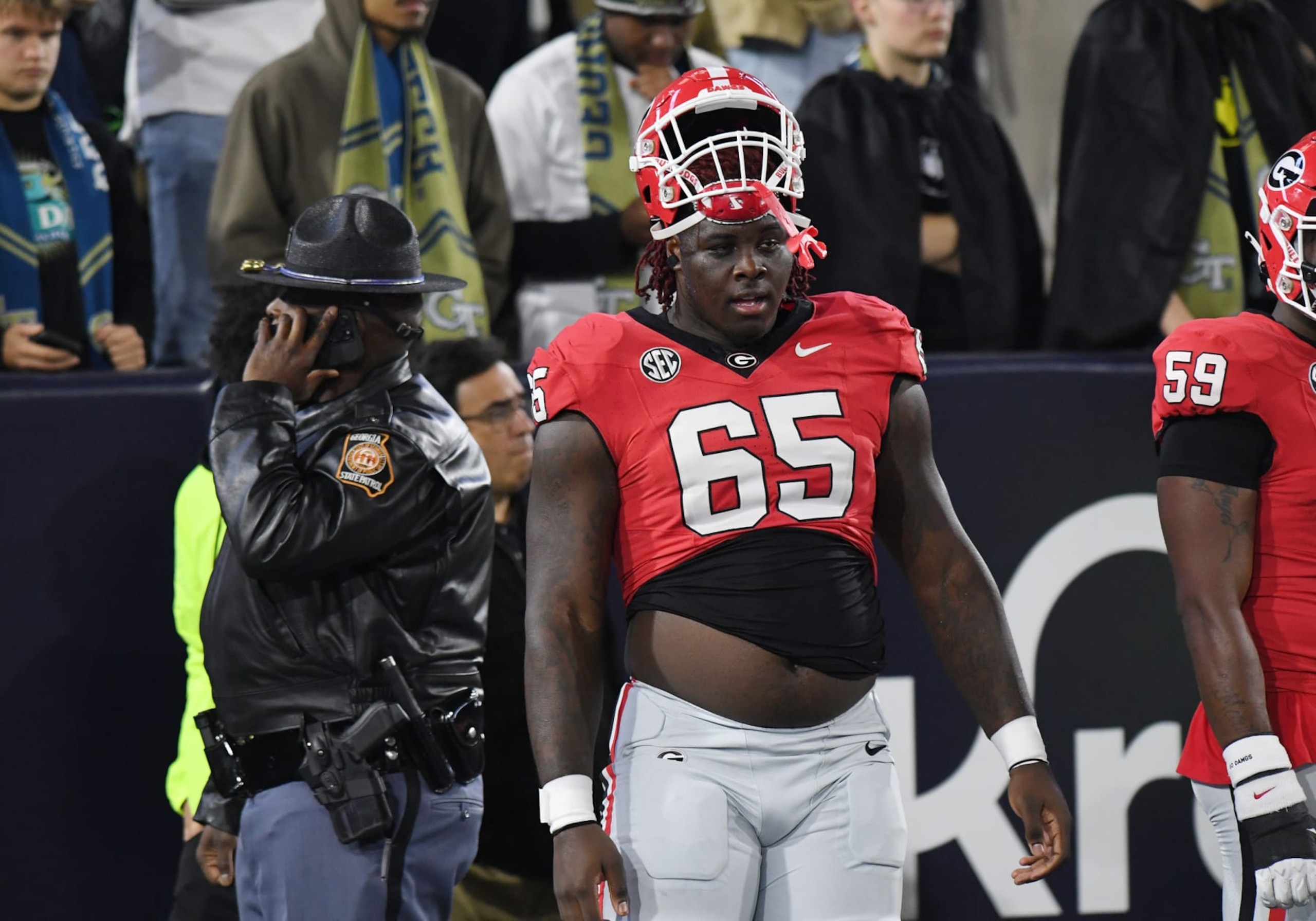 ATLANTA, GA - NOVEMBER 25: Georgia Bulldogs Offensive Linemen Amarius Mims (65) looks on prior to the college football game between the Georgia Bulldogs and the Georgia Tech Yellow Jackets on November 25, 2023, at Bobby Dodd Stadium in Atlanta, GA. (Photo by Jeffrey Vest/Icon Sportswire via Getty Images) ATLANTA, GA - NOVEMBER 25: Georgia Bulldogs Offensive Linemen Amarius Mims (65) looks on prior to the college football game between the Georgia Bulldogs and the Georgia Tech Yellow Jackets on November 25, 2023, at Bobby Dodd Stadium in Atlanta, GA. (Photo by Jeffrey Vest/Icon Sportswire via Getty Images)