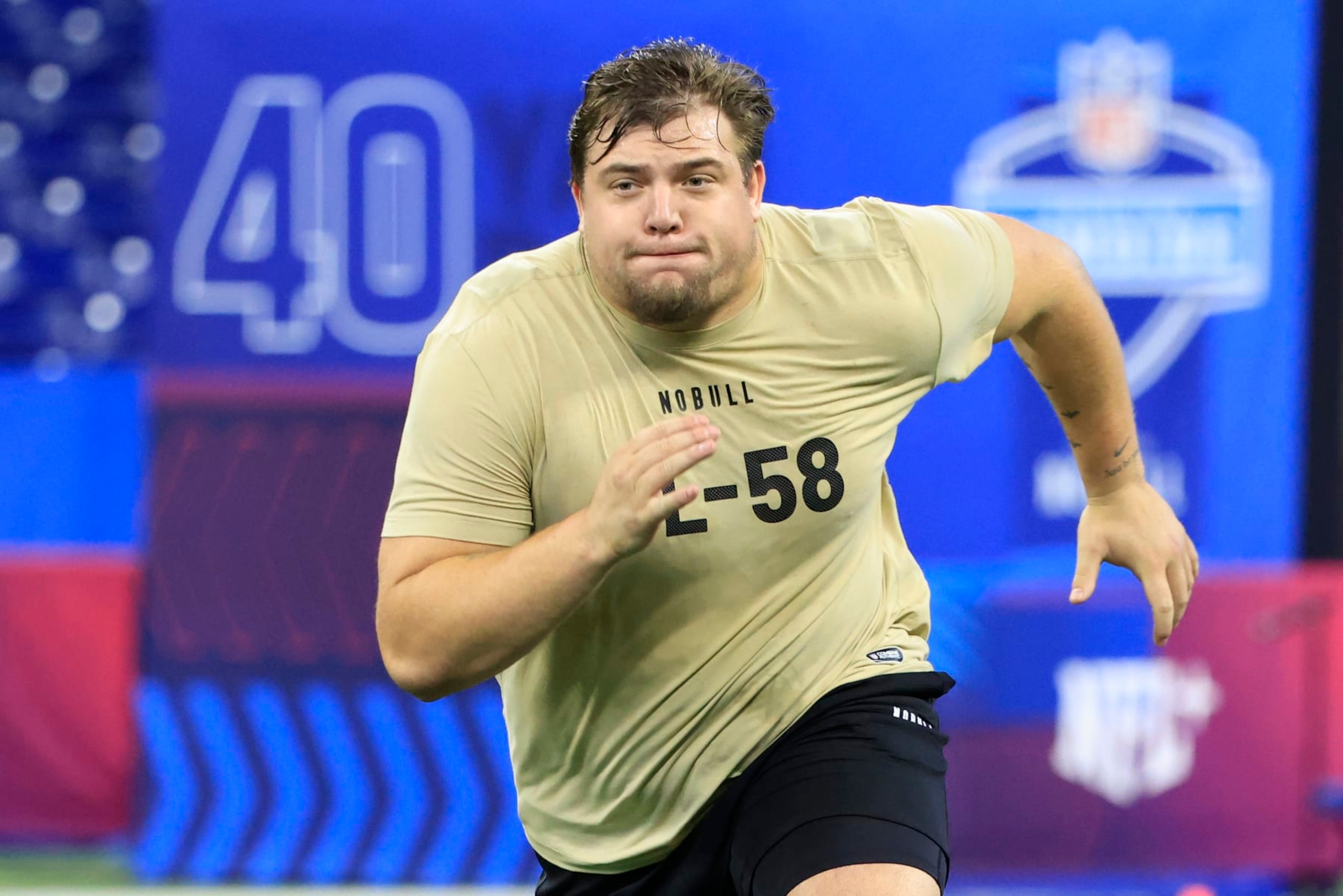 INDIANAPOLIS, INDIANA - MARCH 03: Jackson Powers-Johnson #OL58 of the Oregon participates in a drill during the NFL Combine at Lucas Oil Stadium on March 03, 2024 in Indianapolis, Indiana. (Photo by Justin Casterline/Getty Images) INDIANAPOLIS, INDIANA - MARCH 03: Jackson Powers-Johnson #OL58 of the Oregon participates in a drill during the NFL Combine at Lucas Oil Stadium on March 03, 2024 in Indianapolis, Indiana. (Photo by Justin Casterline/Getty Images)