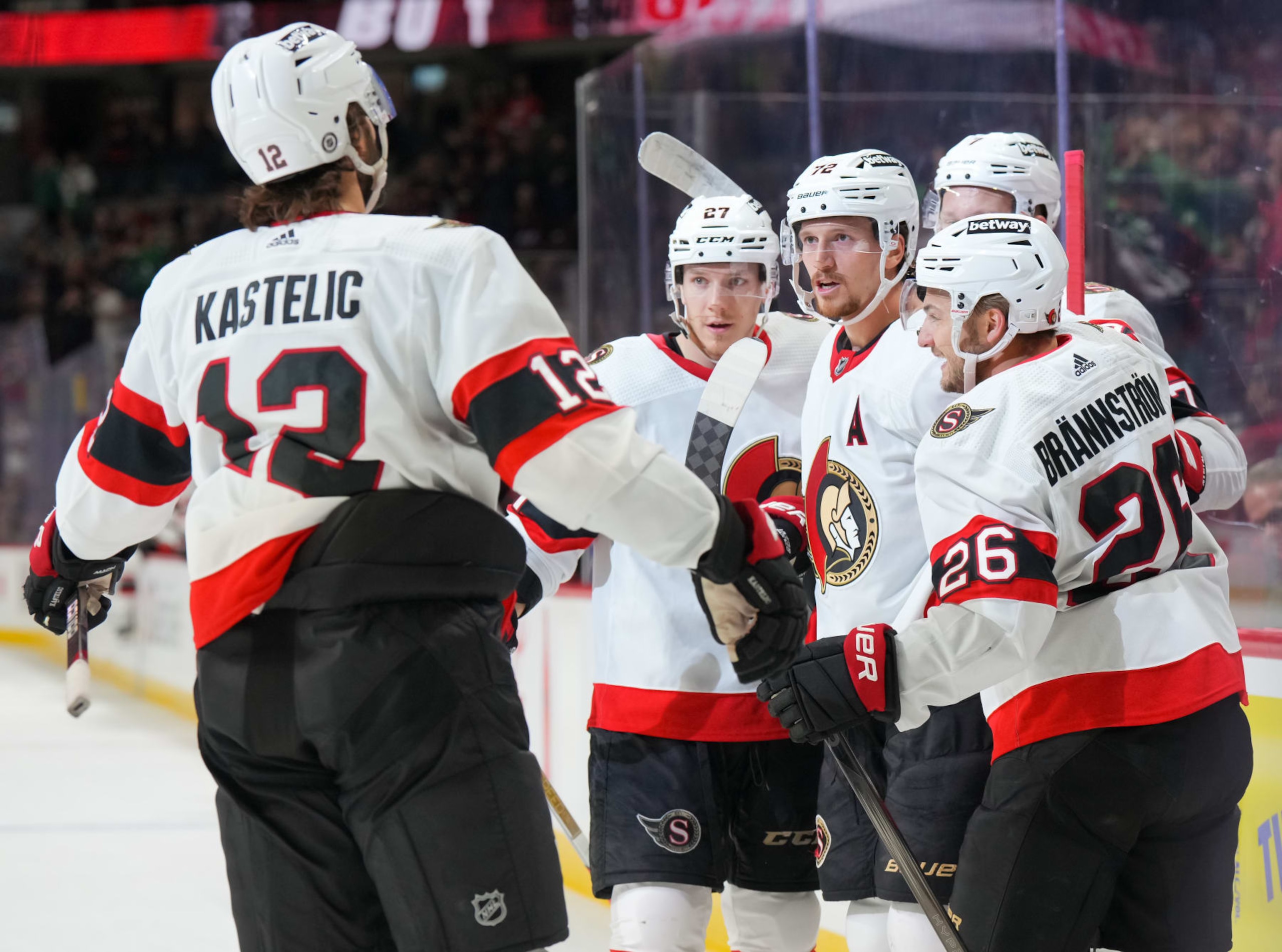 OTTAWA, CANADA - MARCH 17: Thomas Chabot #72 of the Ottawa Senators celebrates his first period goal against the Carolina Hurricanes with teammates Parker Kelly #27, Mark Kastelic #12, Brady Tkachuk #7 and Erik Brannstrom #26  at Canadian Tire Centre on March 17, 2024 in Ottawa, Ontario, Canada.  (Photo by André Ringuette/NHLI via Getty Images)