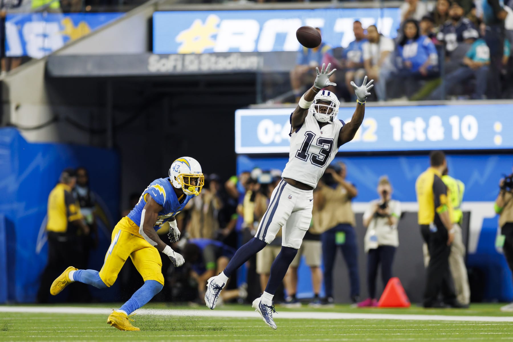 INGLEWOOD, CALIFORNIA - OCTOBER 16: Michael Gallup #13 of the Dallas Cowboys catches a pass during an NFL football game against the Los Angeles Chargers at SoFi Stadium on October 16, 2023 in Inglewood, California. (Photo by Ryan Kang/Getty Images)