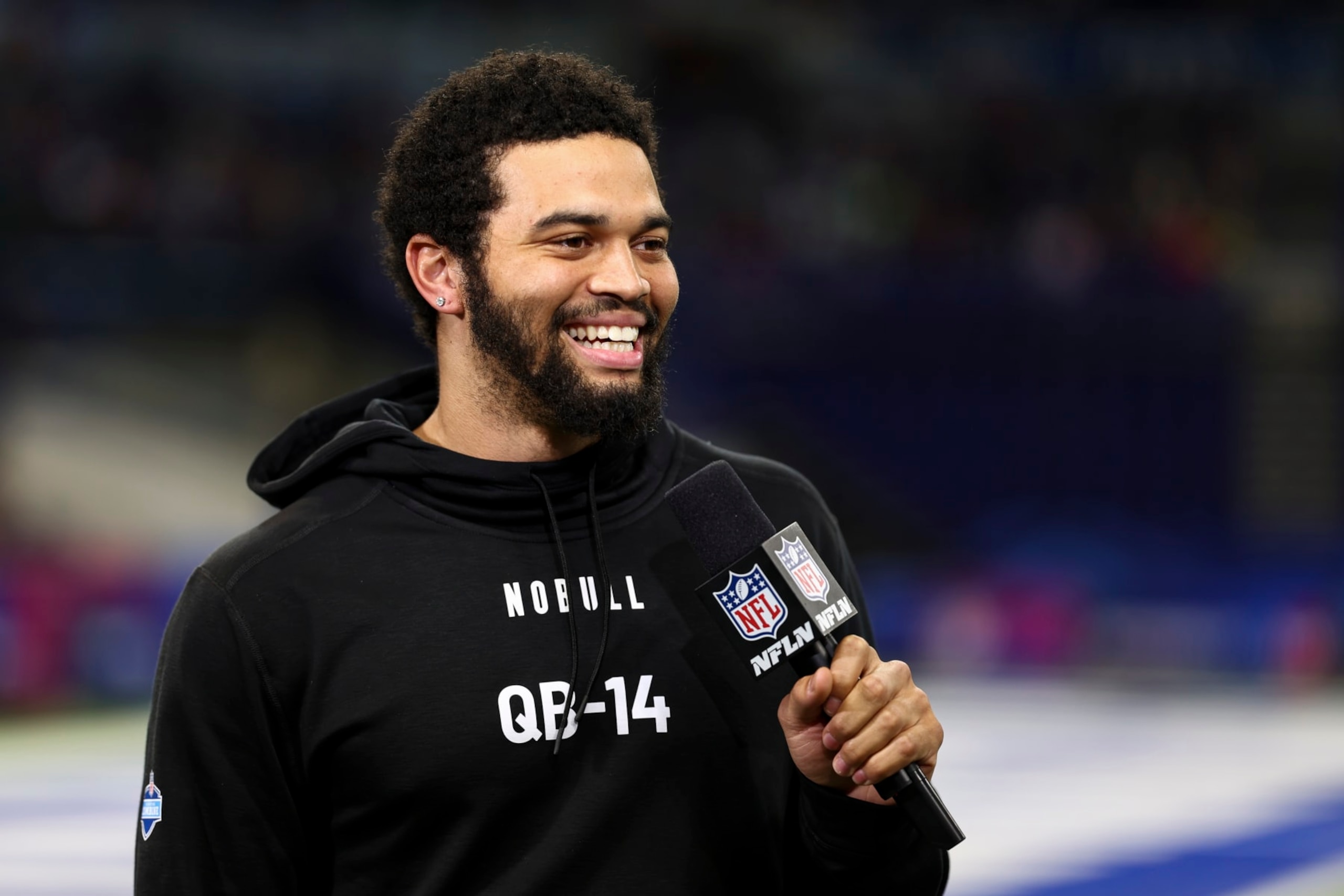 INDIANAPOLIS, INDIANA - MARCH 2: Caleb Williams #QB14 of Southern California smiles during the NFL Combine at the Lucas Oil Stadium on March 2, 2024 in Indianapolis, Indiana. (Photo by Kevin Sabitus/Getty Images)