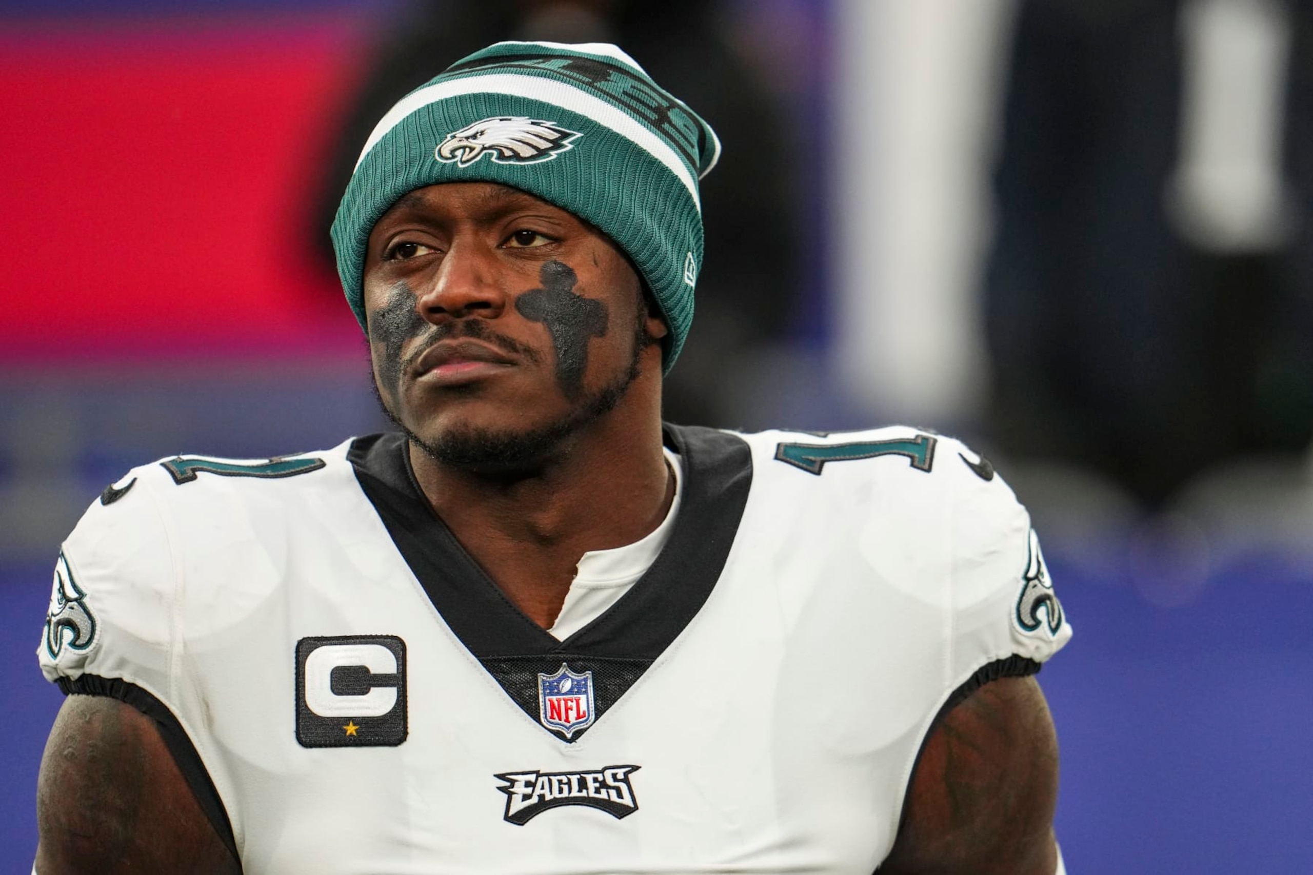 EAST RUTHERFORD, NJ - JANUARY 07: A.J. Brown #11 of the Philadelphia Eagles looks on from the sideline prior to an NFL football game against the New York Giants at MetLife Stadium on January 7, 2024 in East Rutherford, New Jersey. (Photo by Cooper Neill/Getty Images)