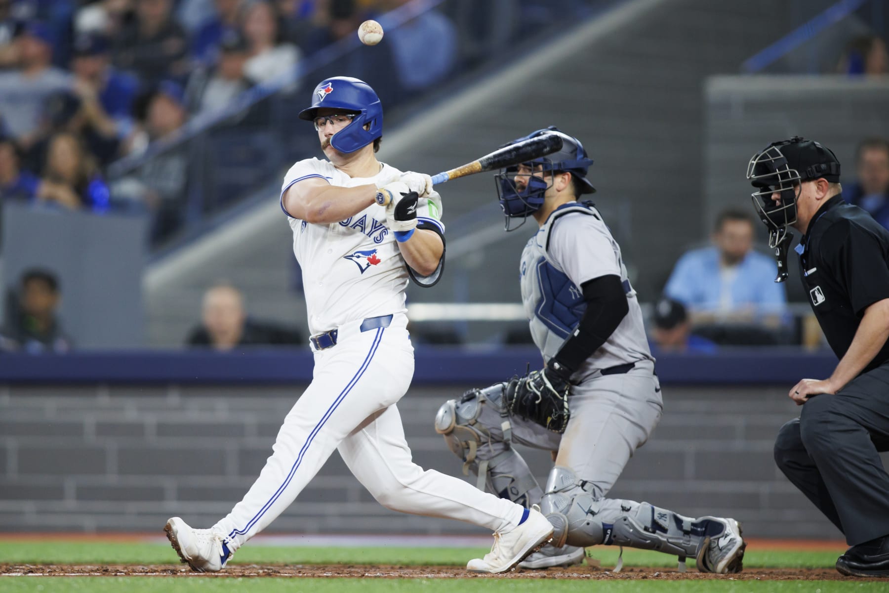 TORONTO, CANADA - APRIL 17: Davis Schneider #36 of the Toronto Blue Jays at bat during their MLB game against the New York Yankees at Rogers Centre on April 17, 2024 in Toronto, Canada. (Photo by Cole Burston/Getty Images)