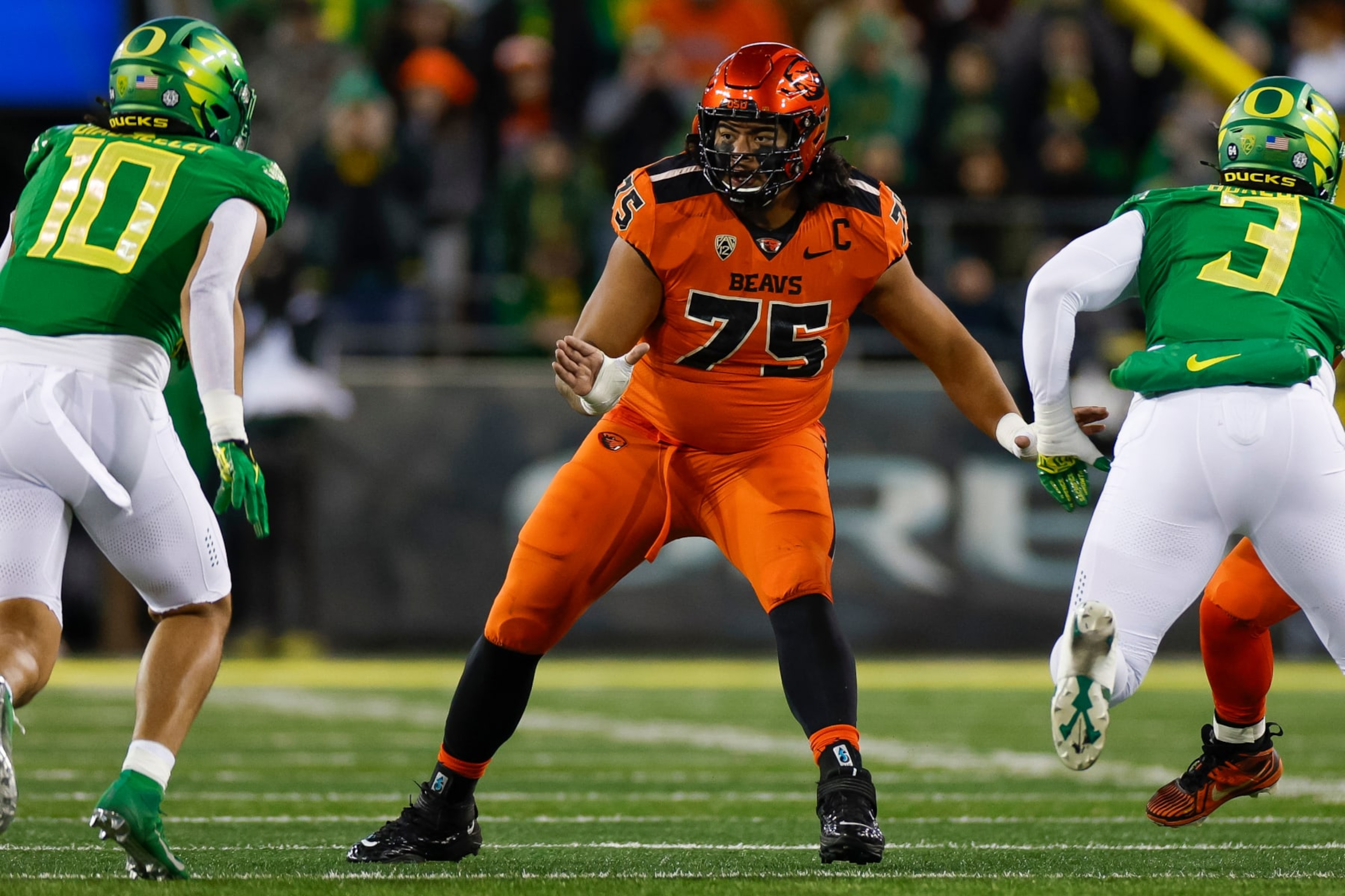 EUGENE, OREGON - NOVEMBER 24: Taliese Fuaga #75 of the Oregon State Beavers blocks during a game against the Oregon Ducks at Autzen Stadium on November 24, 2023 in Eugene, Oregon. (Photo by Brandon Sloter/Image Of Sport/Getty Images) EUGENE, OREGON - NOVEMBER 24: Taliese Fuaga #75 of the Oregon State Beavers blocks during a game against the Oregon Ducks at Autzen Stadium on November 24, 2023 in Eugene, Oregon. (Photo by Brandon Sloter/Image Of Sport/Getty Images)