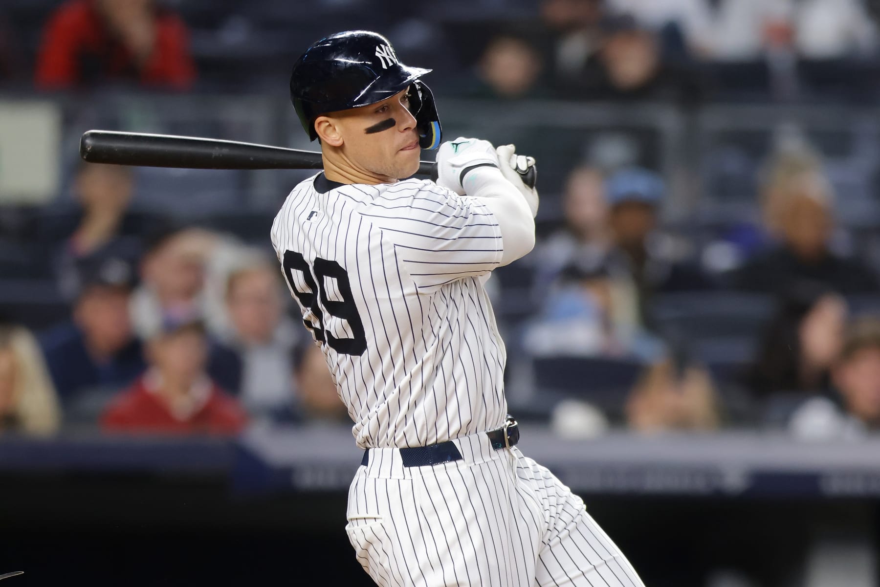 NEW YORK, NEW YORK - APRIL 24: Aaron Judge #99 of the New York Yankees singles to right field in the third inning against the Oakland Athletics at Yankee Stadium on April 24, 2024 in New York City. (Photo by Mike Stobe/Getty Images)
