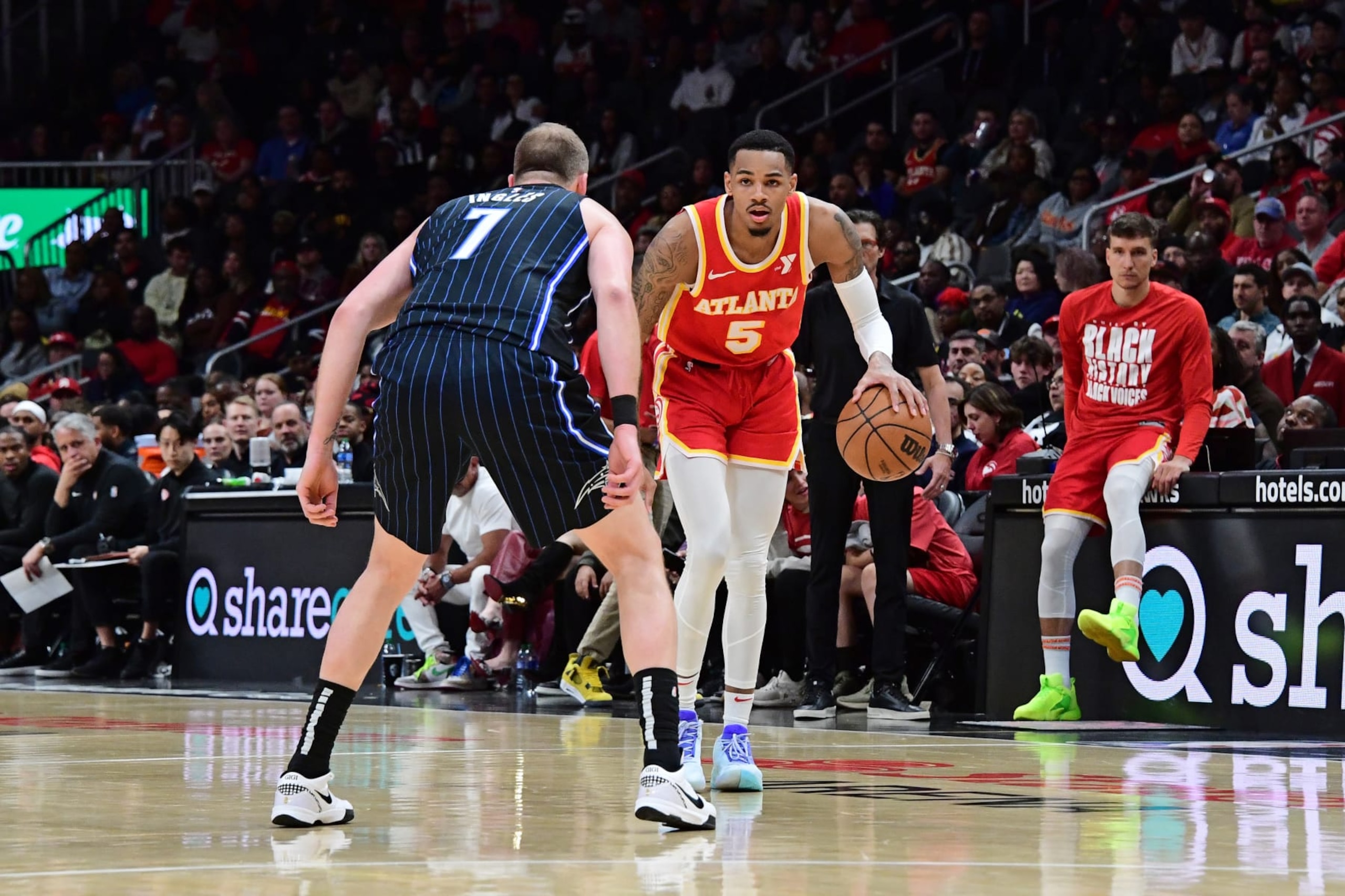 ATLANTA, GA - FEBRUARY 25: Dejounte Murray #5 of the Atlanta Hawks dribbles the ball during the game against the Orlando Magic on February 25, 2024 at State Farm Arena in Atlanta, Georgia.  NOTE TO USER: User expressly acknowledges and agrees that, by downloading and/or using this Photograph, user is consenting to the terms and conditions of the Getty Images License Agreement. Mandatory Copyright Notice: Copyright 2024 NBAE (Photo by Scott Cunningham/NBAE via Getty Images)