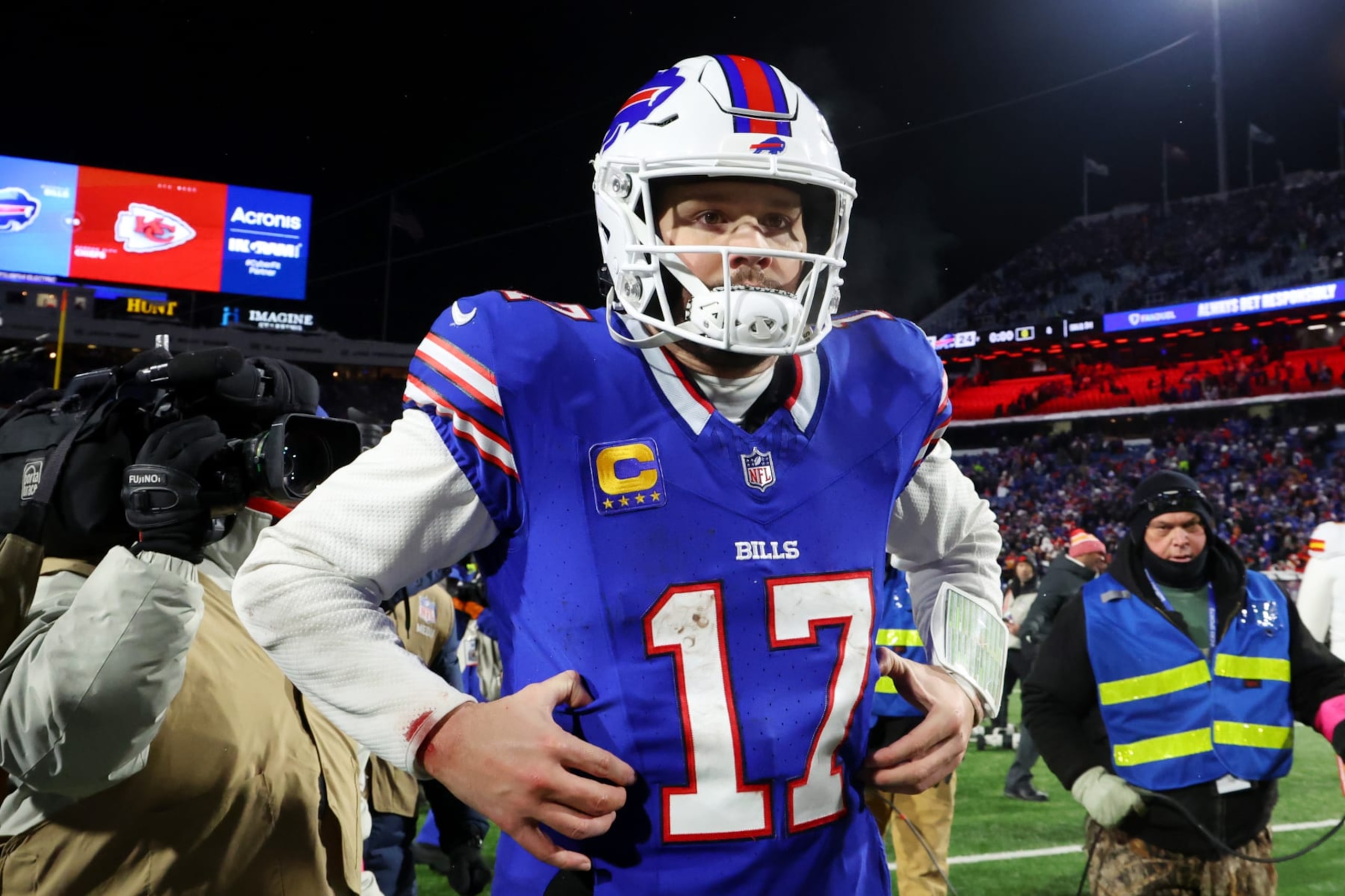 ORCHARD PARK, NEW YORK - JANUARY 21: Josh Allen #17 of the Buffalo Bills runs off the field after being defeated by the Kansas City Chiefs in the AFC Divisional Playoff game at Highmark Stadium on January 21, 2024 in Orchard Park, New York. (Photo by Timothy T Ludwig/Getty Images) ORCHARD PARK, NEW YORK - JANUARY 21: Josh Allen #17 of the Buffalo Bills runs off the field after being defeated by the Kansas City Chiefs in the AFC Divisional Playoff game at Highmark Stadium on January 21, 2024 in Orchard Park, New York. (Photo by Timothy T Ludwig/Getty Images)