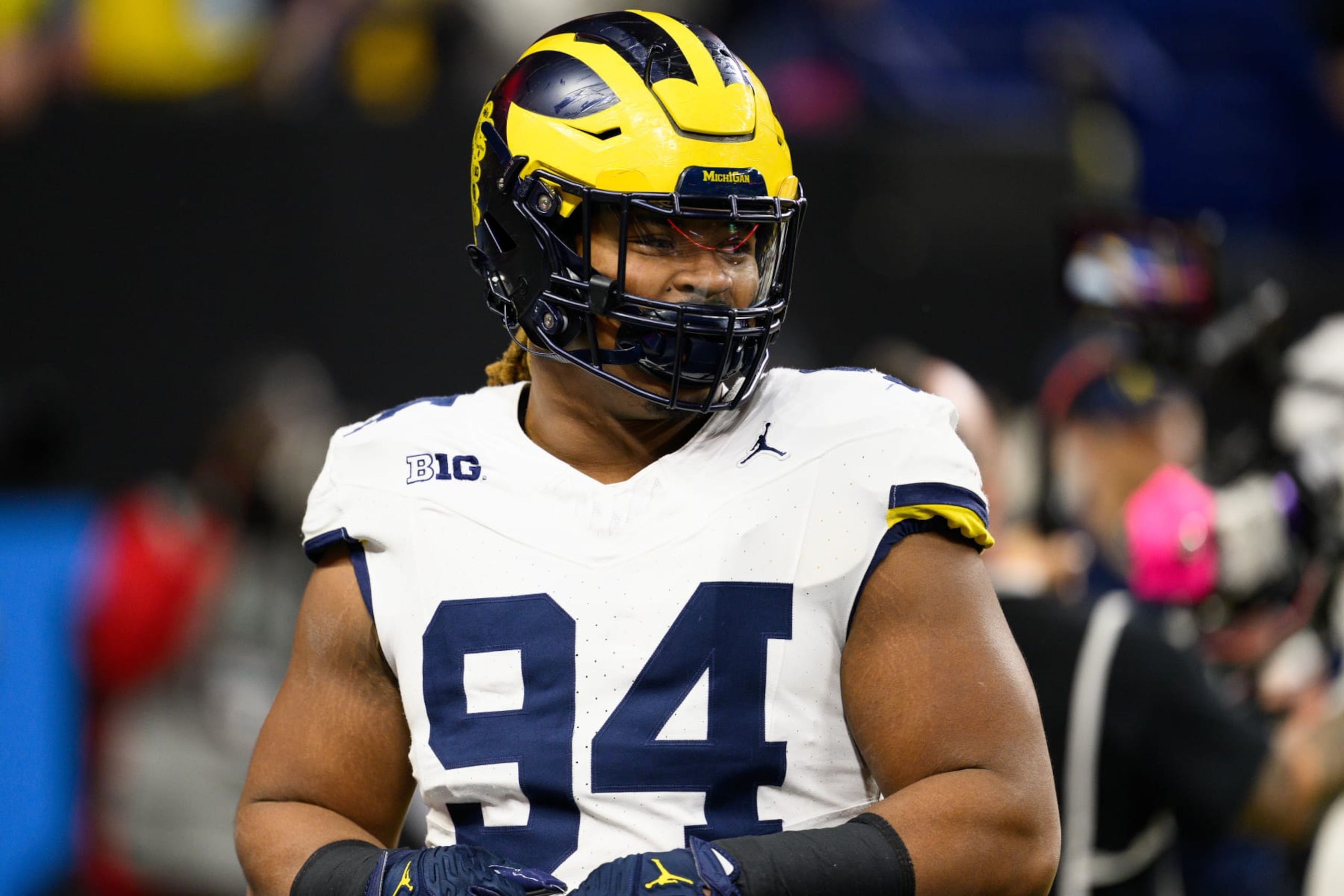 INDIANAPOLIS, IN - DECEMBER 02: Michigan Wolverines defensive lineman Kris Jenkins (94) warms up on the field before the Big 10 Championship game between the Michigan Wolverines and Iowa Hawkeyes on December 2, 2023, at Lucas Oil Stadium in Indianapolis, IN. (Photo by Zach Bolinger/Icon Sportswire via Getty Images)