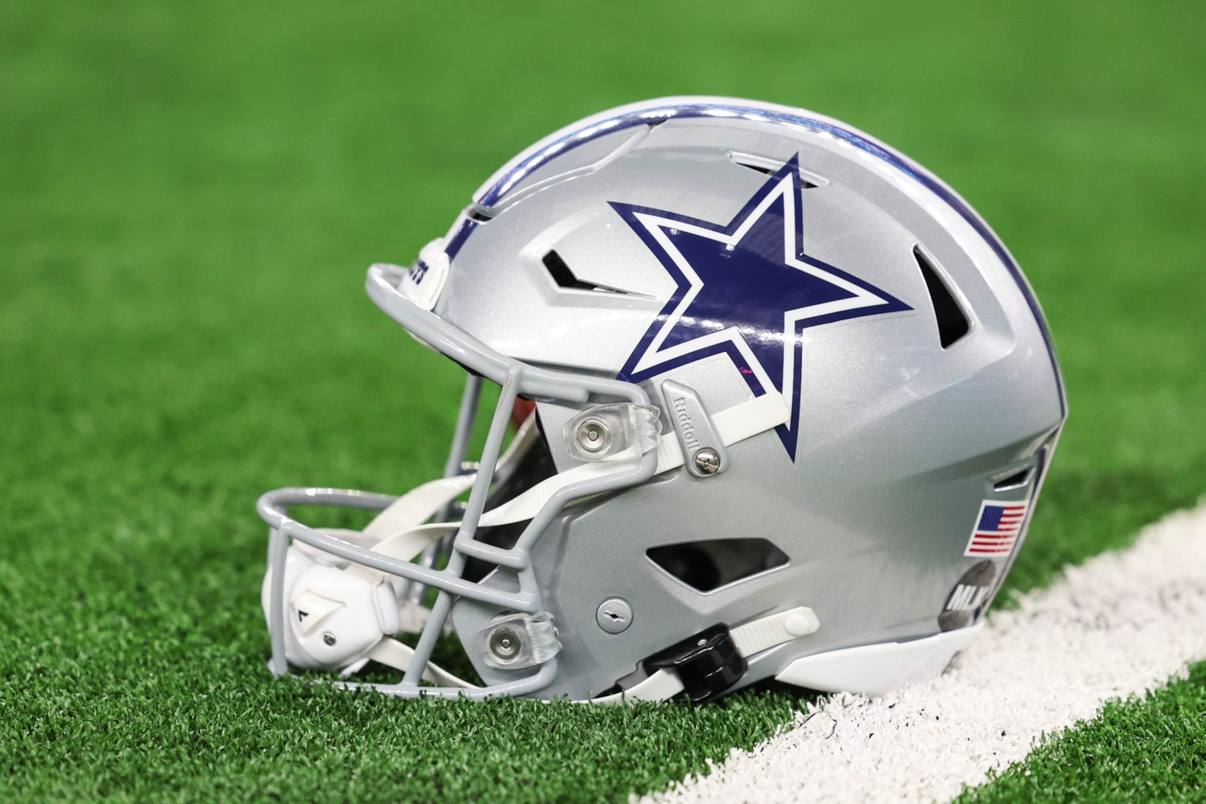 ARLINGTON, TX - JANUARY 14: Detailed view of a Dallas Cowboys helmet prior to an NFL wild-card playoff football between the Green Bay Packers and the Dallas Cowboys at AT&T Stadium on January 14, 2024 in Arlington, Texas. (Photo by Perry Knotts/Getty Images) ARLINGTON, TX - JANUARY 14: Detailed view of a Dallas Cowboys helmet prior to an NFL wild-card playoff football between the Green Bay Packers and the Dallas Cowboys at AT&T Stadium on January 14, 2024 in Arlington, Texas. (Photo by Perry Knotts/Getty Images)