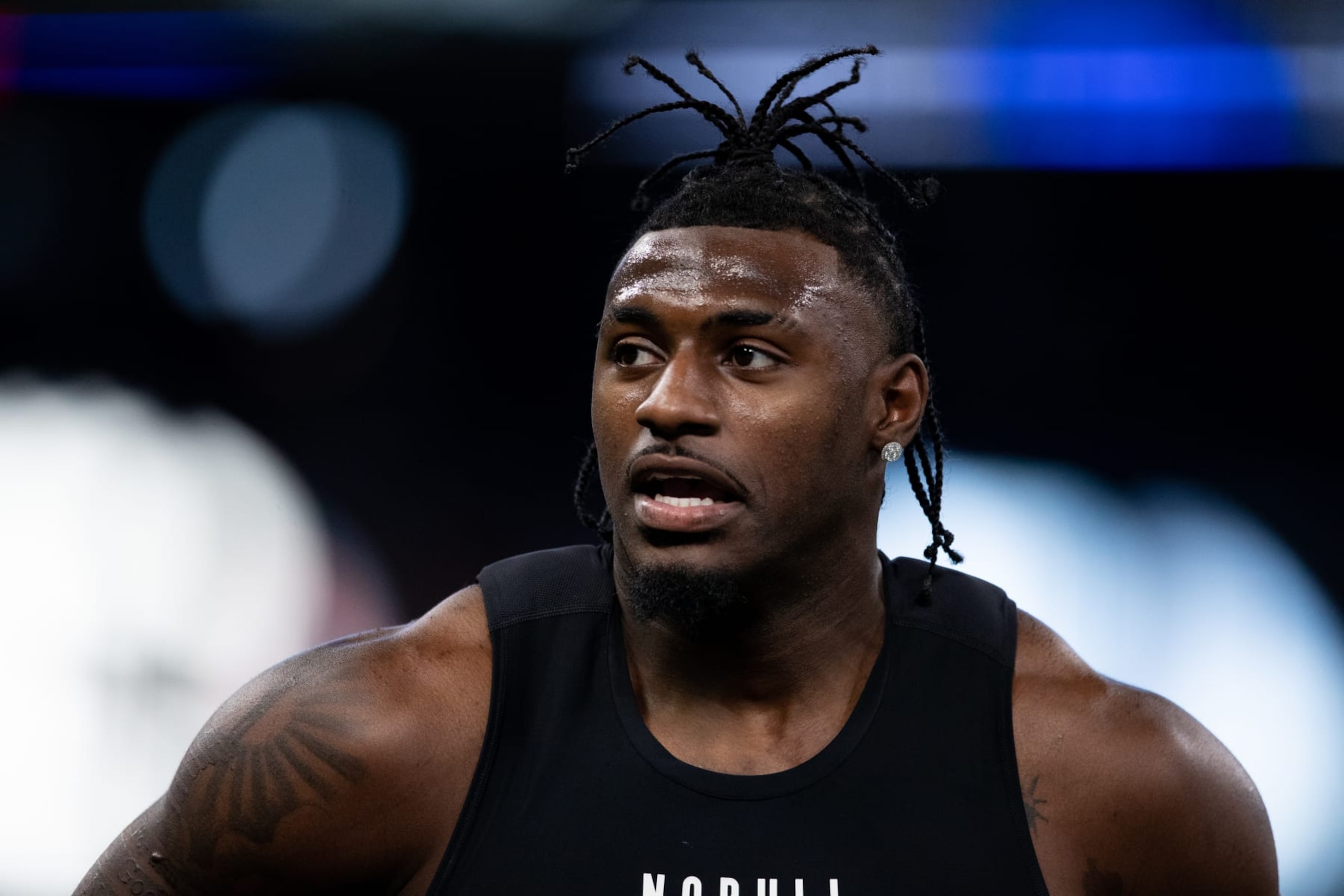 INDIANAPOLIS, INDIANA - MARCH 2: Xavier Legette #WO14 of South Carolina warms up during the NFL Scouting Combine at Lucas Oil Stadium on March 2, 2024 in Indianapolis, Indiana. (Photo by Kara Durrette/Getty Images)