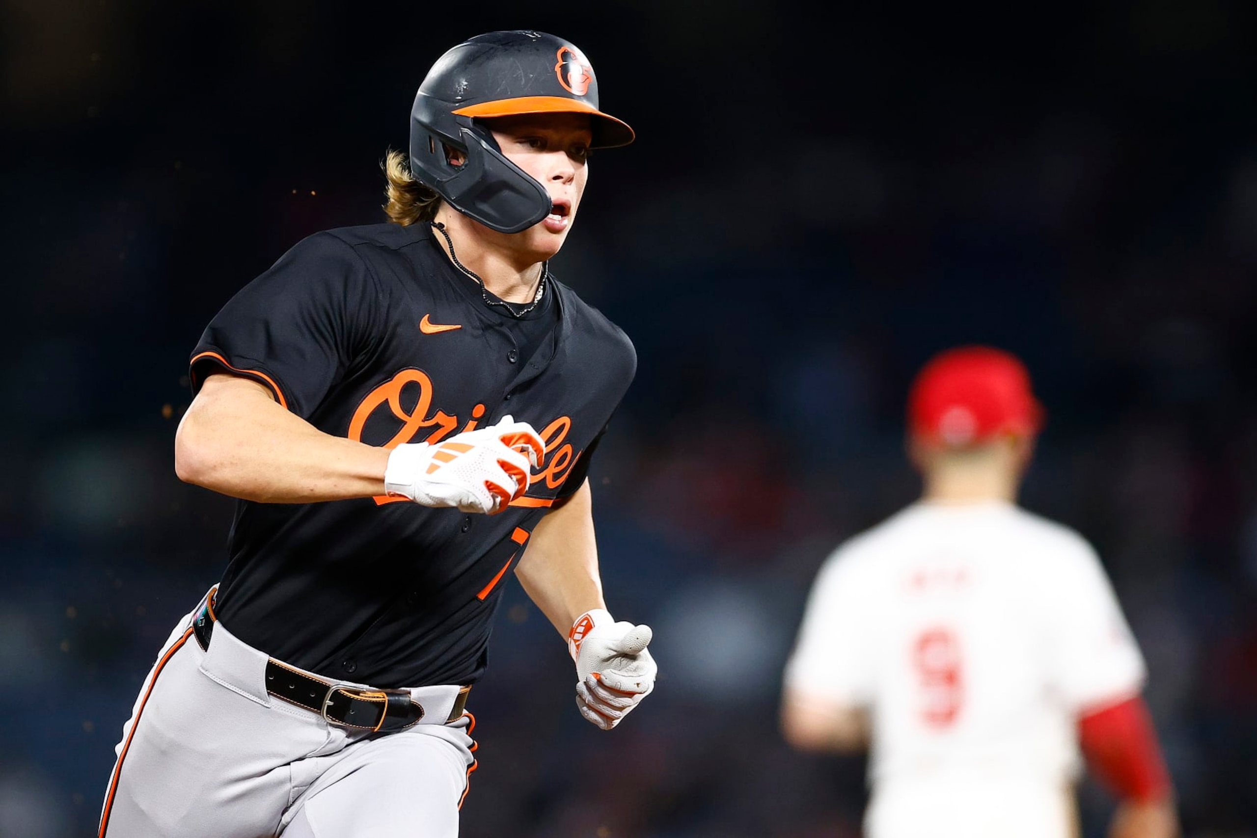 ANAHEIM, CALIFORNIA - APRIL 23:  Jackson Holliday #7 of the Baltimore Orioles runs to third base against the Los Angeles Angels in the fifth inning at Angel Stadium of Anaheim on April 23, 2024 in Anaheim, California. (Photo by Ronald Martinez/Getty Images)