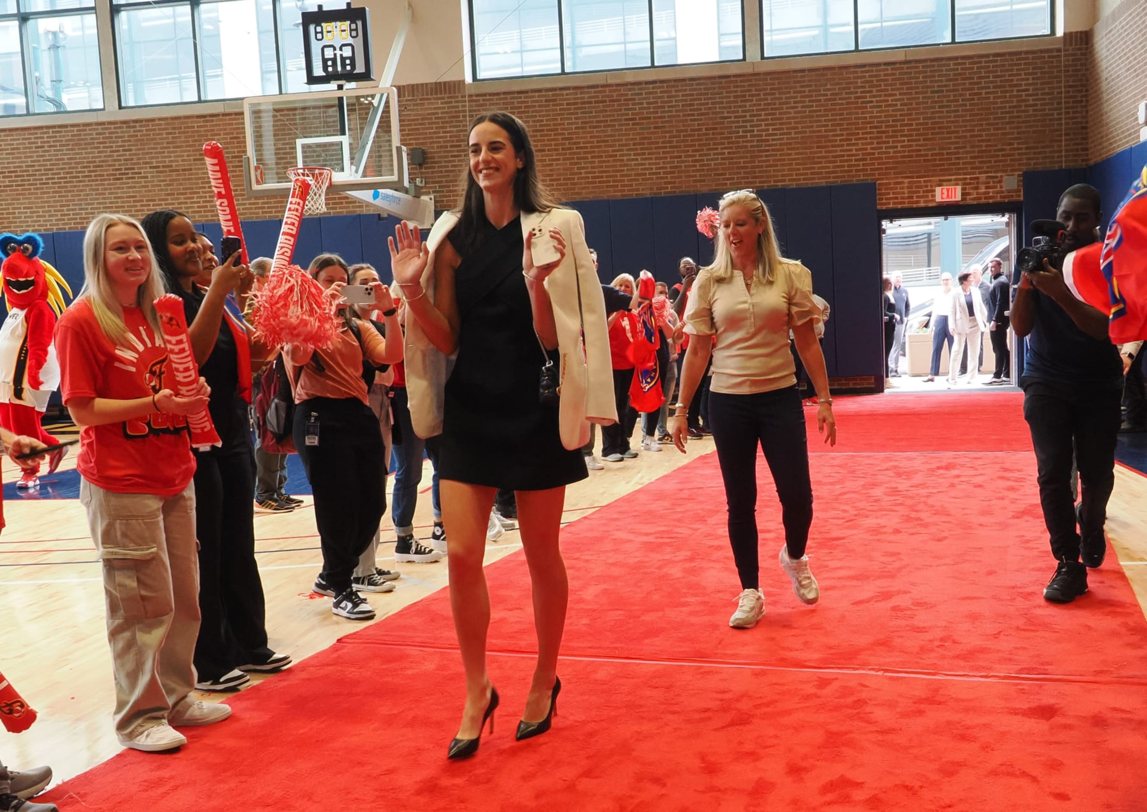INDIANAPOLIS, IN - APRIL 17: Caitlin Clark and Christie Sides of the Indiana Fever arrive at Gainbridge Fieldhouse prior to Clark's introductory press conference on April 17, 2024 at Gainbridge Fieldhouse in Indianapolis, Indiana. NOTE TO USER: User expressly acknowledges and agrees that, by downloading and or using this Photograph, user is consenting to the terms and conditions of the Getty Images License Agreement. Mandatory Copyright Notice: Copyright 2024 NBAE (Photo by Ron Hoskins/NBAE via Getty Images) INDIANAPOLIS, IN - APRIL 17: Caitlin Clark and Christie Sides of the Indiana Fever arrive at Gainbridge Fieldhouse prior to Clark's introductory press conference on April 17, 2024 at Gainbridge Fieldhouse in Indianapolis, Indiana. NOTE TO USER: User expressly acknowledges and agrees that, by downloading and or using this Photograph, user is consenting to the terms and conditions of the Getty Images License Agreement. Mandatory Copyright Notice: Copyright 2024 NBAE (Photo by Ron Hoskins/NBAE via Getty Images)