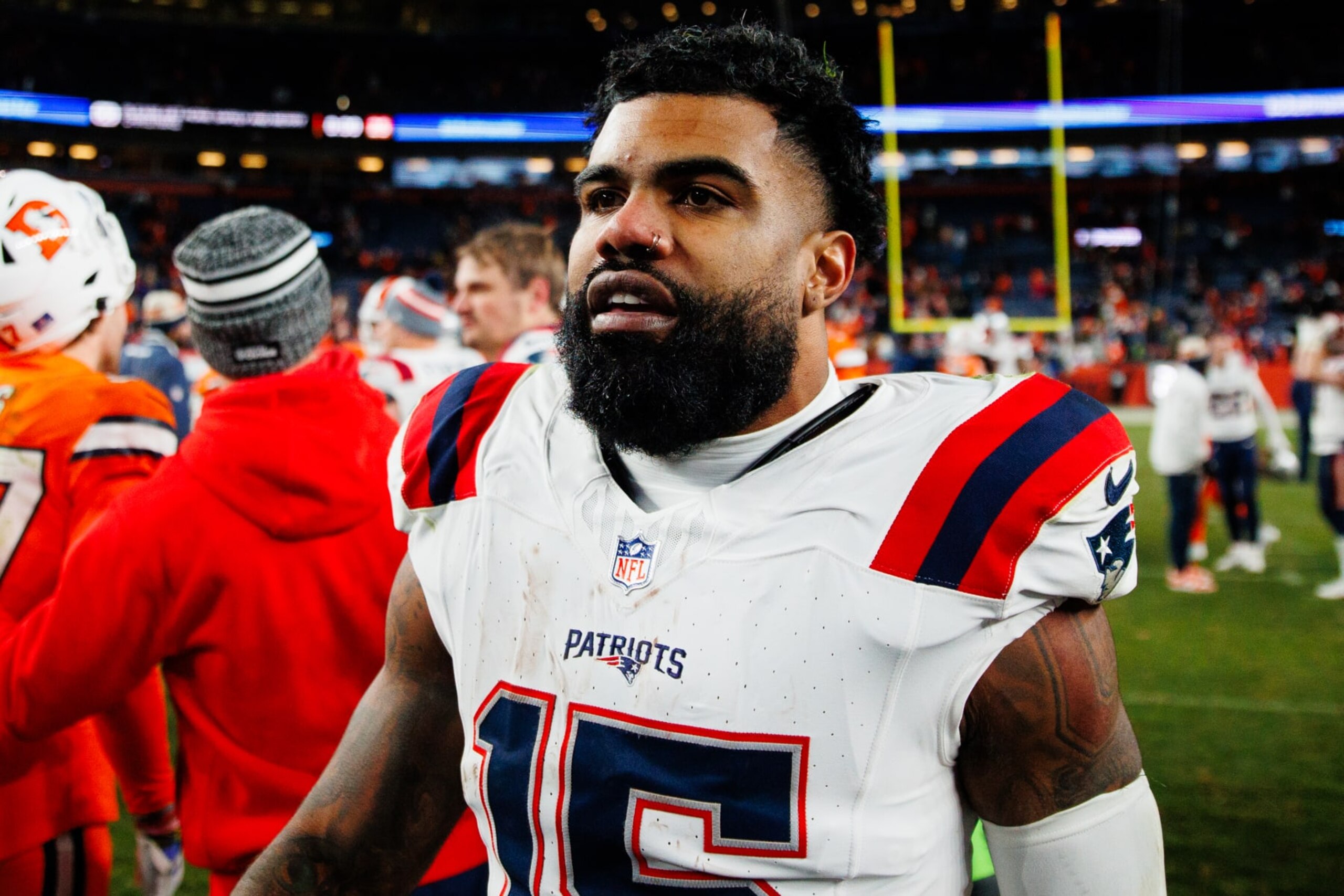DENVER, CO - JANUARY 24:  Running back Ezekiel Elliott #15 of the New England Patriots walks on the field after the 26-23 win against the Denver Broncos at Empower Field at Mile High on December 24, 2023 in Denver, Colorado. (Photo by Justin Edmonds/Getty Images)
