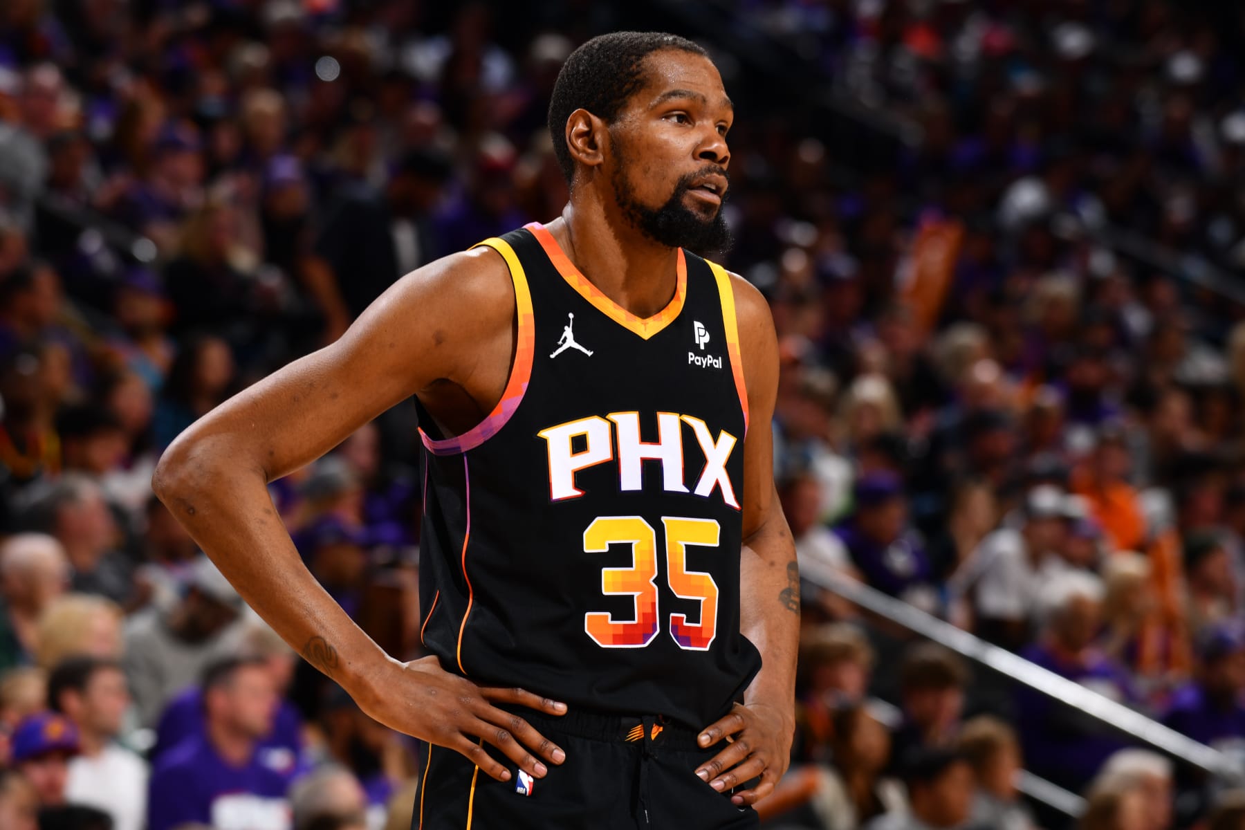 PHOENIX, AZ - APRIL 26: Kevin Durant #35 of the Phoenix Suns looks on during the game against the Minnesota Timberwolves during Round 1 Game 3 of the 2024 NBA Playoffs on April 26, 2024 at Footprint Center in Phoenix, Arizona. NOTE TO USER: User expressly acknowledges and agrees that, by downloading and or using this photograph, user is consenting to the terms and conditions of the Getty Images License Agreement. Mandatory Copyright Notice: Copyright 2024 NBAE (Photo by Barry Gossage/NBAE via Getty Images)