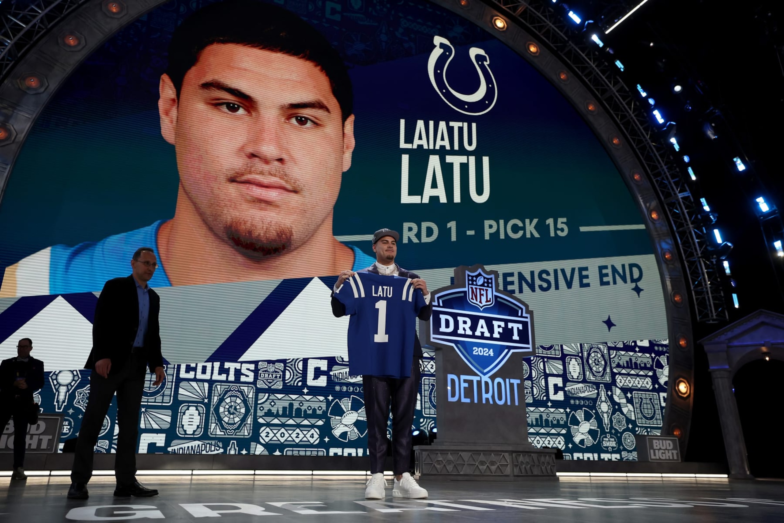 DETROIT, MICHIGAN - APRIL 25: Laiatu Latu poses after being selected 15th overall by the Indianapolis Colts during the first round of the 2024 NFL Draft at Campus Martius Park and Hart Plaza on April 25, 2024 in Detroit, Michigan. (Photo by Gregory Shamus/Getty Images)