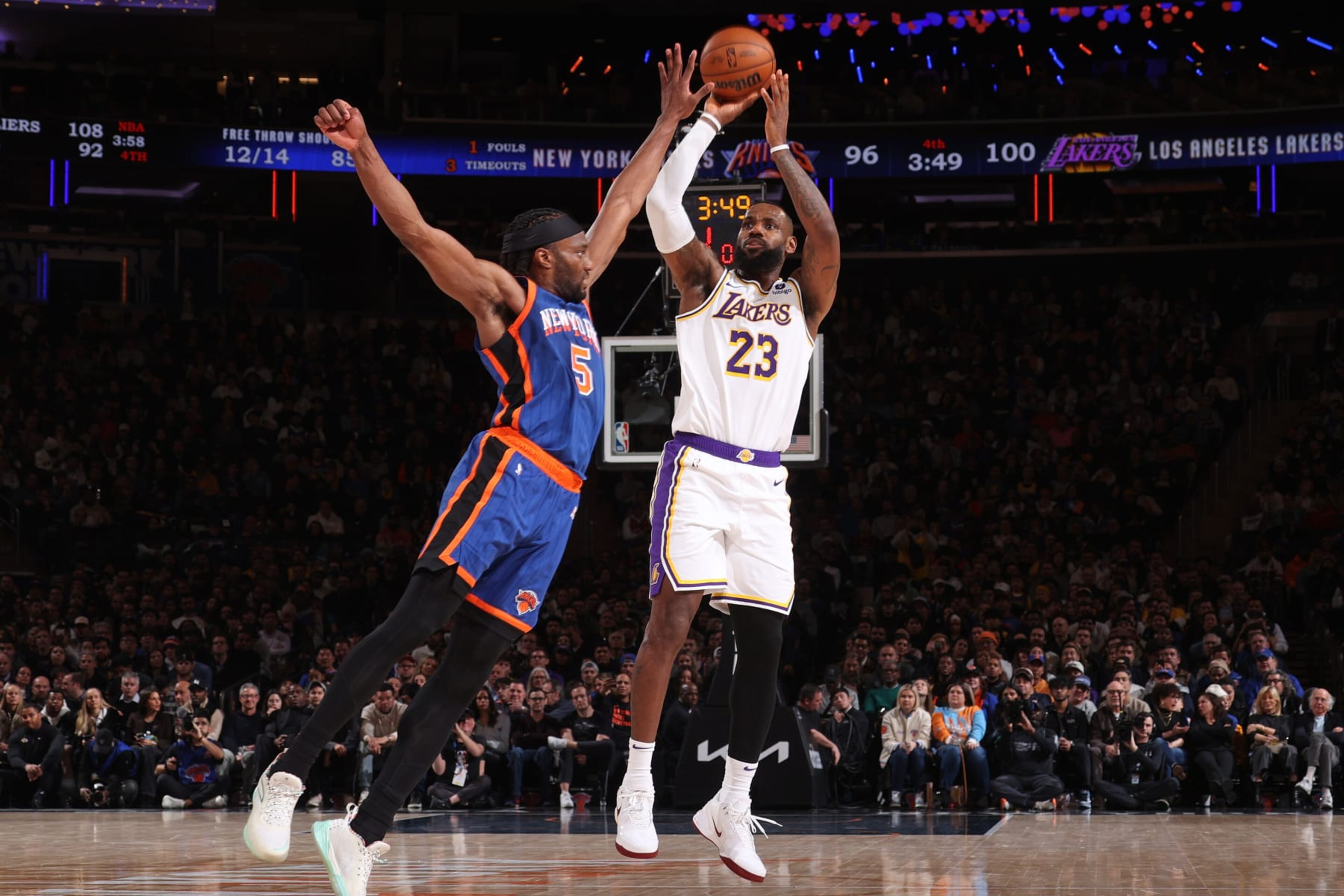 NEW YORK, NY - FEBRUARY 3: LeBron James #23 of the Los Angeles Lakers three point basket during the game against the New York Knicks on February 3, 2024 at Madison Square Garden in New York City, New York.  NOTE TO USER: User expressly acknowledges and agrees that, by downloading and or using this photograph, User is consenting to the terms and conditions of the Getty Images License Agreement. Mandatory Copyright Notice: Copyright 2024 NBAE  (Photo by Nathaniel S. Butler/NBAE via Getty Images)