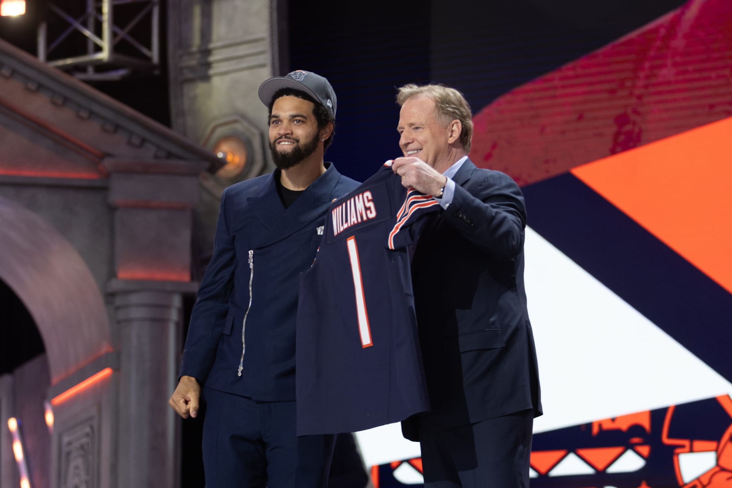 DETROIT, MI - APRIL 25: USC Quarterback Caleb Williams poses with his jersey after being taken first overall by the Chicago Bears during day 1 of the NFL Draft on April 25, 2024 at Fox Theatre in Detroit, MI. (Photo by John Smolek/Icon Sportswire via Getty Images) DETROIT, MI - APRIL 25: USC Quarterback Caleb Williams poses with his jersey after being taken first overall by the Chicago Bears during day 1 of the NFL Draft on April 25, 2024 at Fox Theatre in Detroit, MI. (Photo by John Smolek/Icon Sportswire via Getty Images)