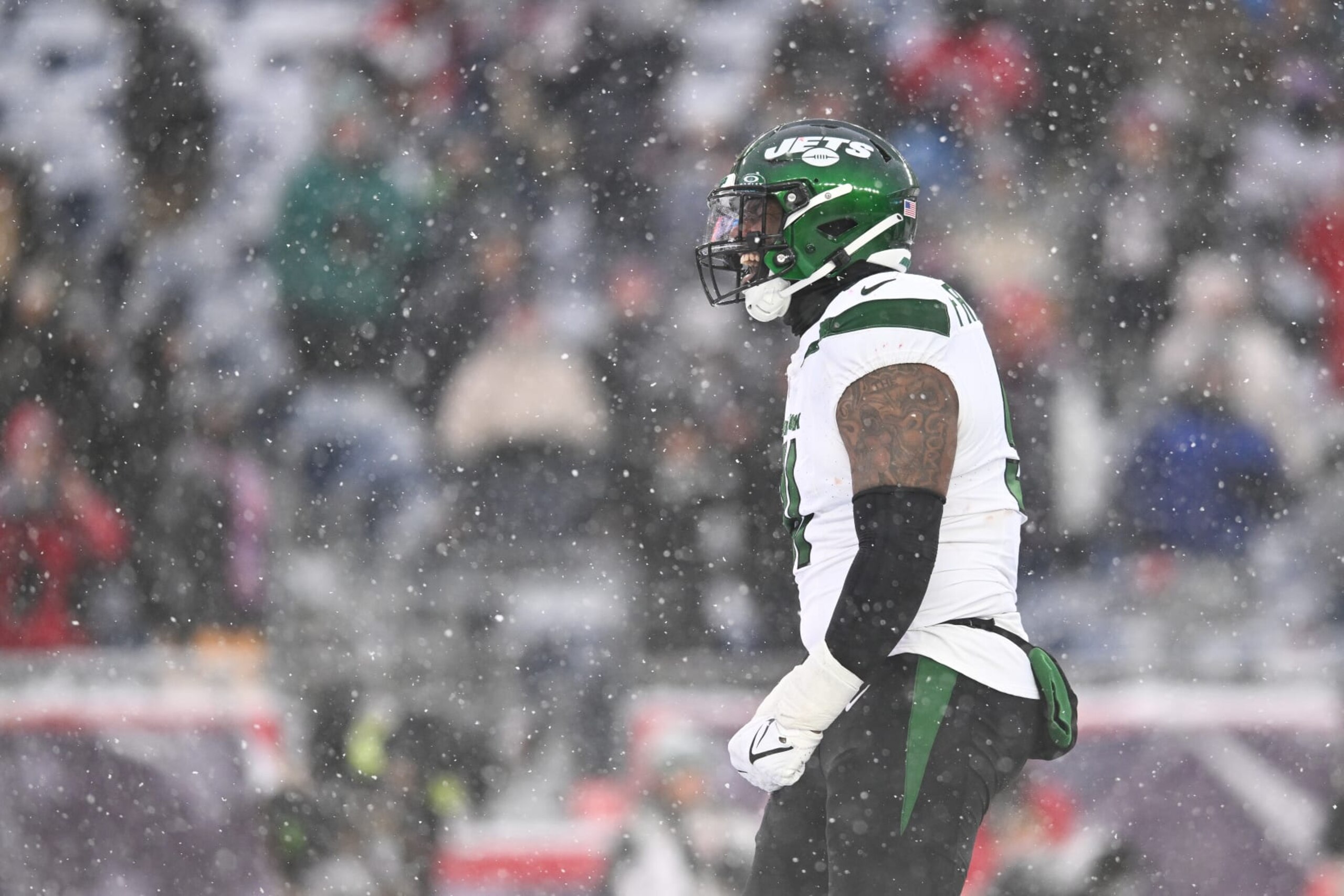 FOXBOROUGH, MA - JANUARY 7: John Franklin-Myers #91 of the New York Jets reacts after a defensive stop during the second half against the New England Patriots at Gillette Stadium on January 7, 2024 in Foxborough, Massachusetts. (Photo by Kathryn Riley/Getty Images)