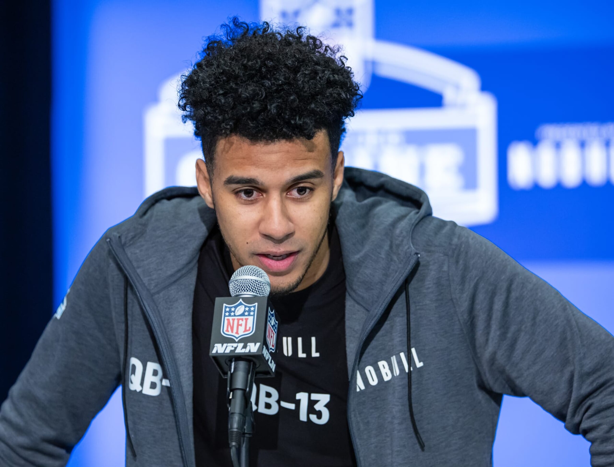 INDIANAPOLIS, INDIANA - MARCH 01: Jordan Travis #QB13 of the Florida State Seminoles speaks to the media during the 2024 NFL Draft Combine at Lucas Oil Stadium on March 01, 2024 in Indianapolis, Indiana. (Photo by Michael Hickey/Getty Images) INDIANAPOLIS, INDIANA - MARCH 01: Jordan Travis #QB13 of the Florida State Seminoles speaks to the media during the 2024 NFL Draft Combine at Lucas Oil Stadium on March 01, 2024 in Indianapolis, Indiana. (Photo by Michael Hickey/Getty Images)