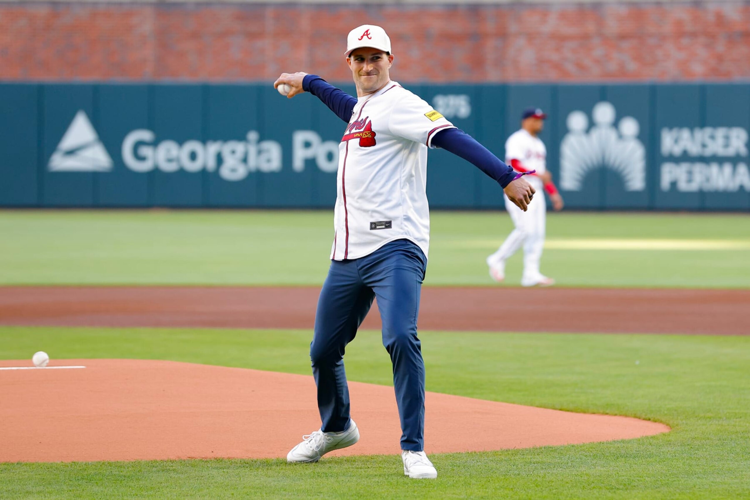 ATLANTA, GEORGIA - APRIL 21: Kirk Cousins of the Atlanta Falcons throws out the first pitch prior to the game between the Texas Rangers and Atlanta Braves at Truist Park on April 21, 2024 in Atlanta, Georgia. (Photo by Todd Kirkland/Getty Images) ATLANTA, GEORGIA - APRIL 21: Kirk Cousins of the Atlanta Falcons throws out the first pitch prior to the game between the Texas Rangers and Atlanta Braves at Truist Park on April 21, 2024 in Atlanta, Georgia. (Photo by Todd Kirkland/Getty Images)
