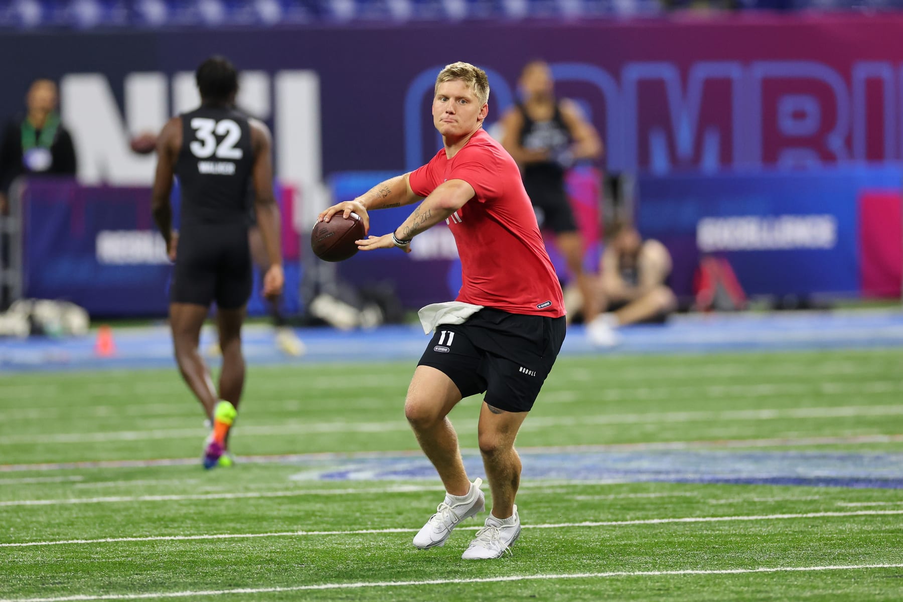INDIANAPOLIS, INDIANA - MARCH 02: Austin Reed #QB11 of Western Kentucky participates in a drill during the NFL Combine at Lucas Oil Stadium on March 02, 2024 in Indianapolis, Indiana. (Photo by Stacy Revere/Getty Images)