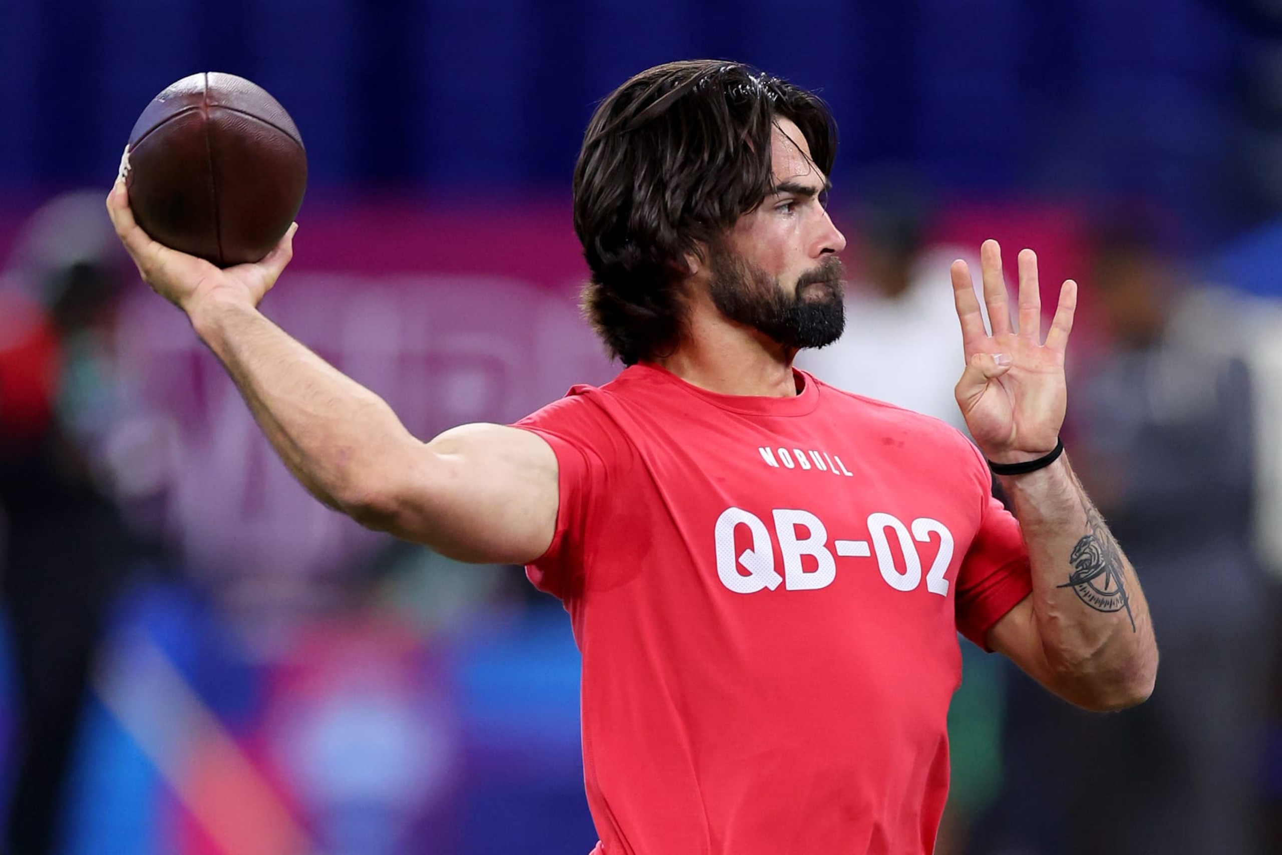 INDIANAPOLIS, INDIANA - MARCH 02: Sam Hartman #QB02 of Notre Dame participates in a drill during the NFL Combine at Lucas Oil Stadium on March 02, 2024 in Indianapolis, Indiana. (Photo by Stacy Revere/Getty Images)