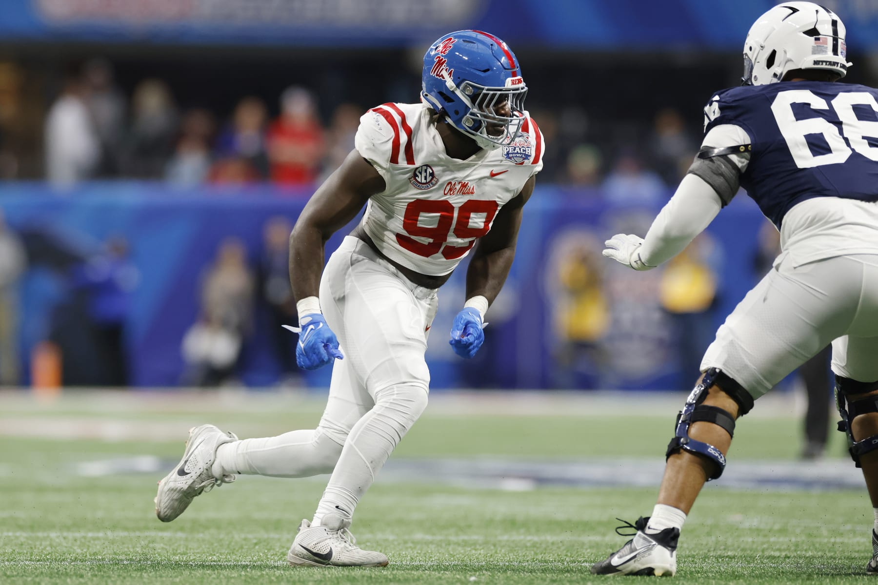 ATLANTA, GA - DECEMBER 30: Mississippi Rebels defensive end Isaac Ukwu (99) rushes on defense during the Chick-fil-A Peach Bowl against the Penn State Nittany Lions on December 30, 2023 at Mercedes-Benz Stadium in Atlanta, Georgia. (Photo by Joe Robbins/Icon Sportswire via Getty Images)