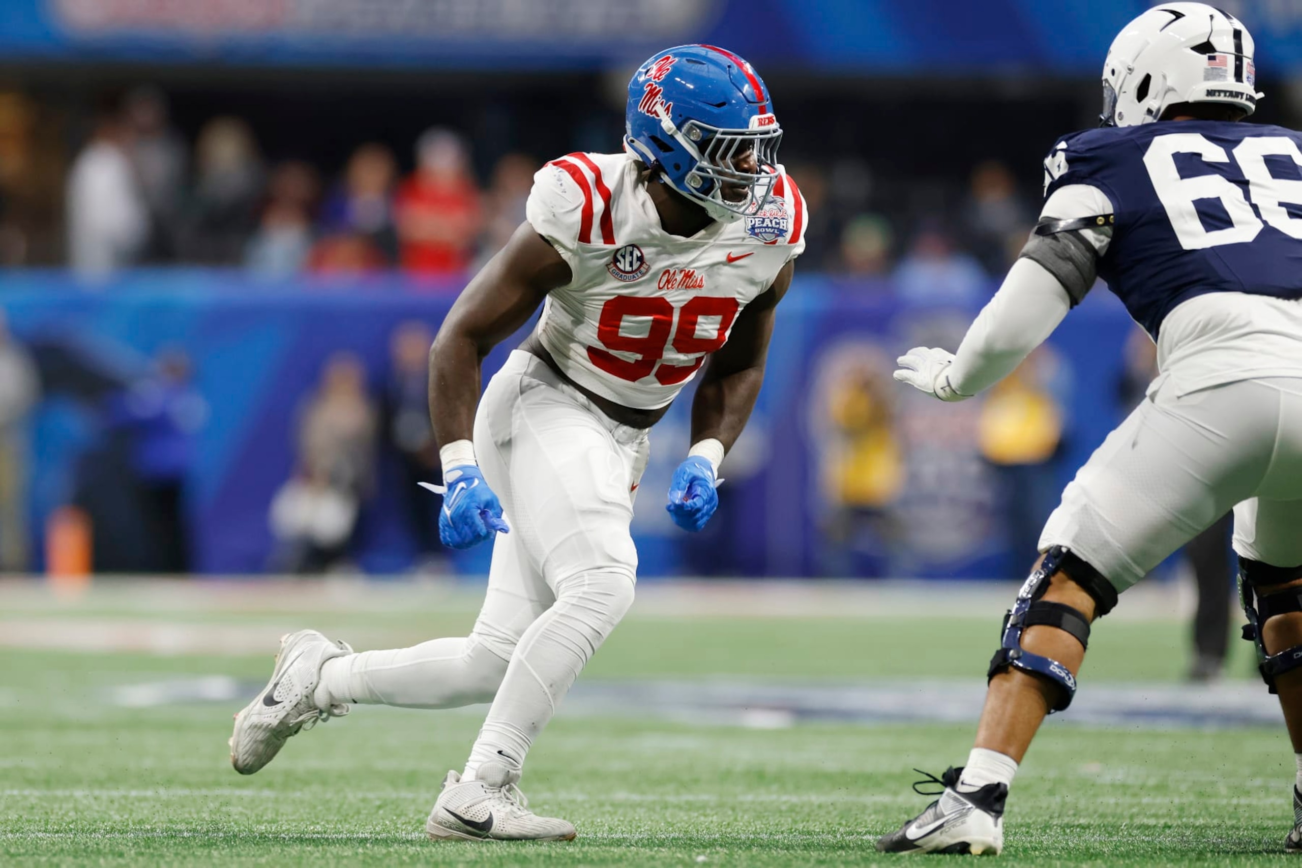 ATLANTA, GA - DECEMBER 30: Mississippi Rebels defensive end Isaac Ukwu (99) rushes on defense during the Chick-fil-A Peach Bowl against the Penn State Nittany Lions on December 30, 2023 at Mercedes-Benz Stadium in Atlanta, Georgia. (Photo by Joe Robbins/Icon Sportswire via Getty Images)