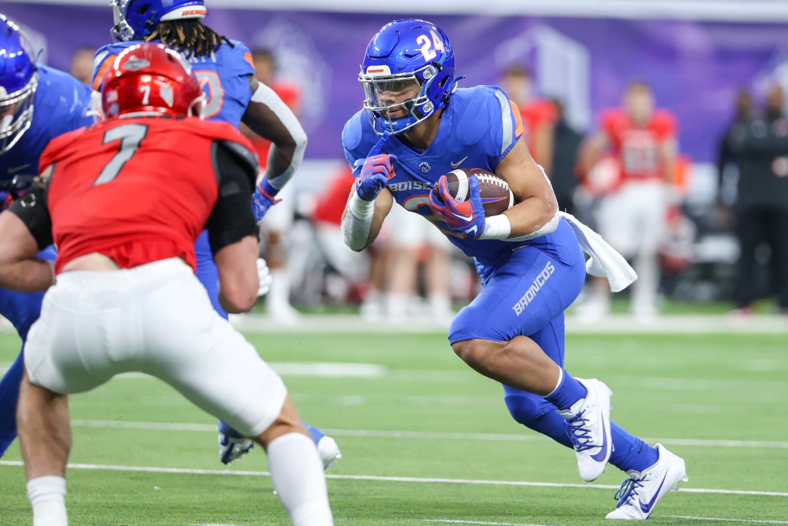 LAS VEGAS, NEVADA - DECEMBER 02: George Holani #24 of the Boise State Broncos runs the ball during the third quarter against the UNLV Rebels during the Mountain West Football Championship at Allegiant Stadium on December 02, 2023 in Las Vegas, Nevada. (Photo by Ian Maule/Getty Images)