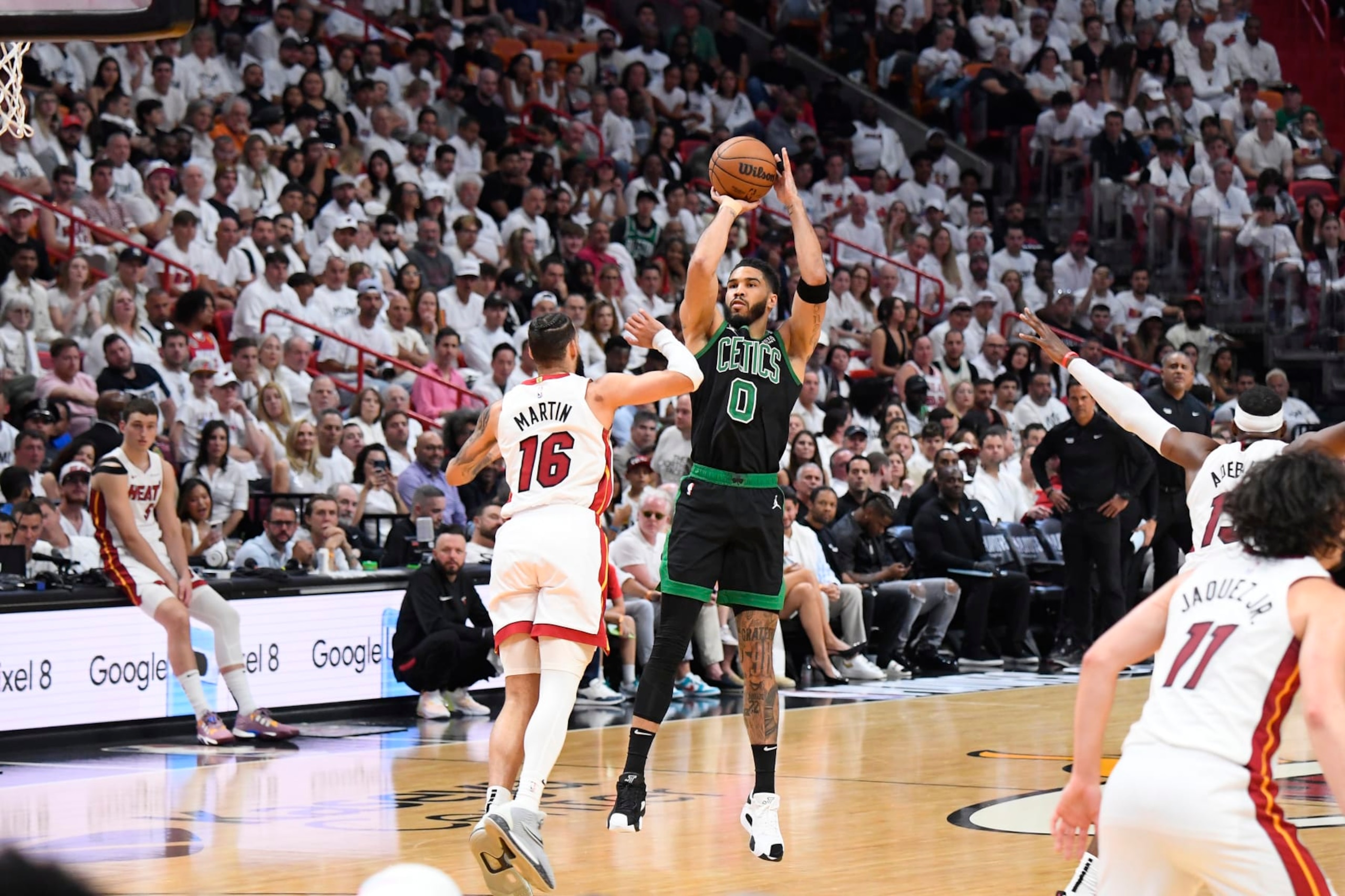 MIAMI, FL - APRIL 27: Jayson Tatum #0 of the Boston Celtics shoots a three point basket against the Miami Heat during Round 1 Game 3 of the 2024 NBA Playoffs on April 27, 2024 at Kaseya Center in Miami, Florida. NOTE TO USER: User expressly acknowledges and agrees that, by downloading and or using this Photograph, user is consenting to the terms and conditions of the Getty Images License Agreement. Mandatory Copyright Notice: Copyright 2024 NBAE (Photo by Brian Babineau/NBAE via Getty Images)