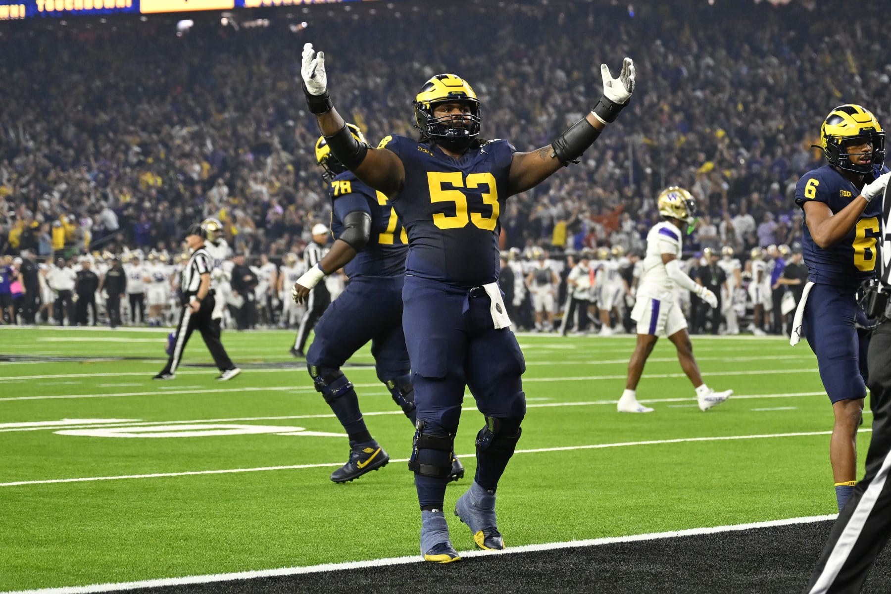 HOUSTON, TEXAS - JANUARY 08: Trente Jones #53 of the Michigan Wolverines celebrates during the first quarter of the 2024 CFP National Championship game against the Washington Huskies at NRG Stadium on January 08, 2024 in Houston, Texas. (Photo by Alika Jenner/Getty Images)