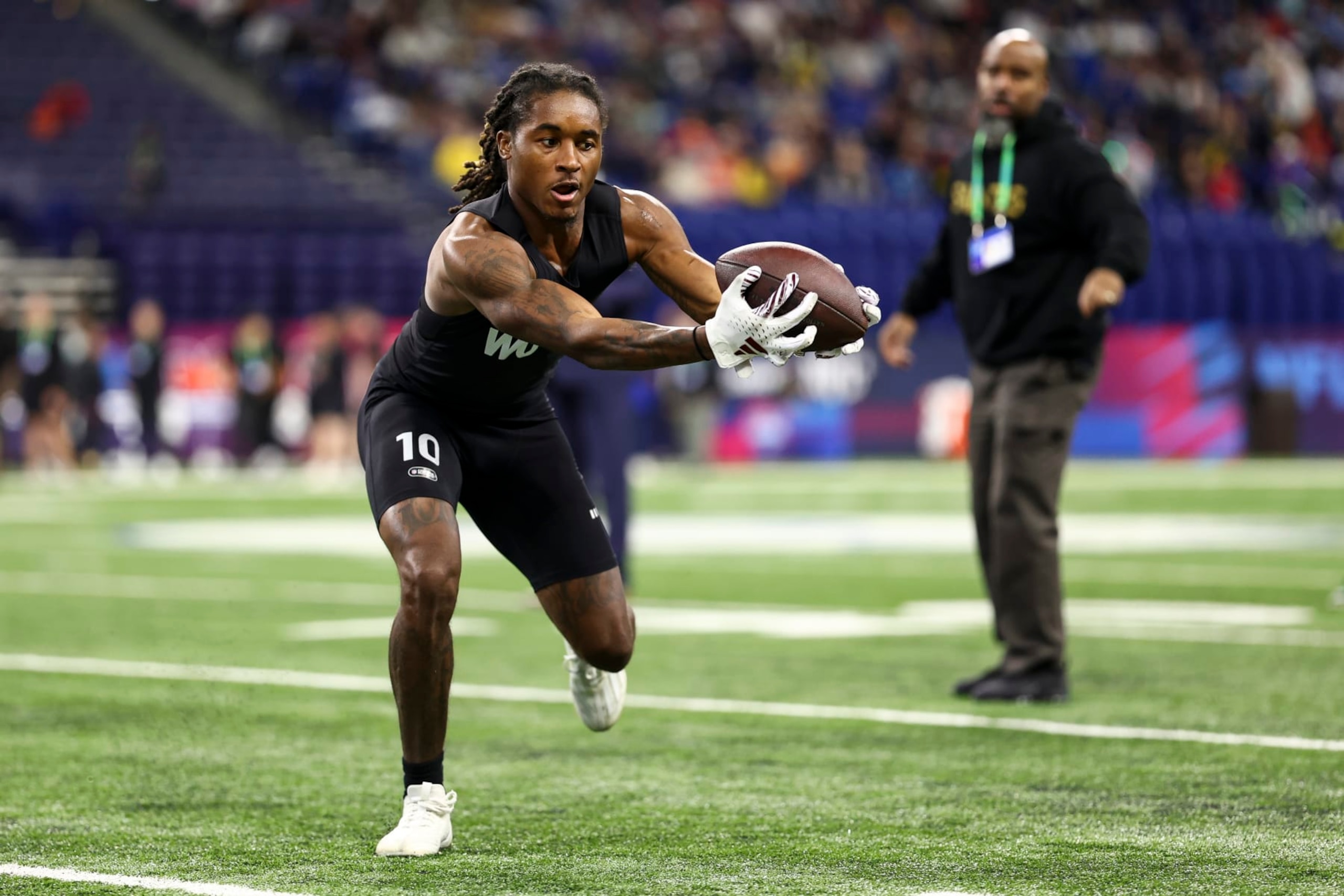 INDIANAPOLIS, INDIANA - MARCH 2: Tulu Griffin #WO10 of Mississippi State participates in a drill during the NFL Combine at the Lucas Oil Stadium on March 2, 2024 in Indianapolis, Indiana. (Photo by Kevin Sabitus/Getty Images)