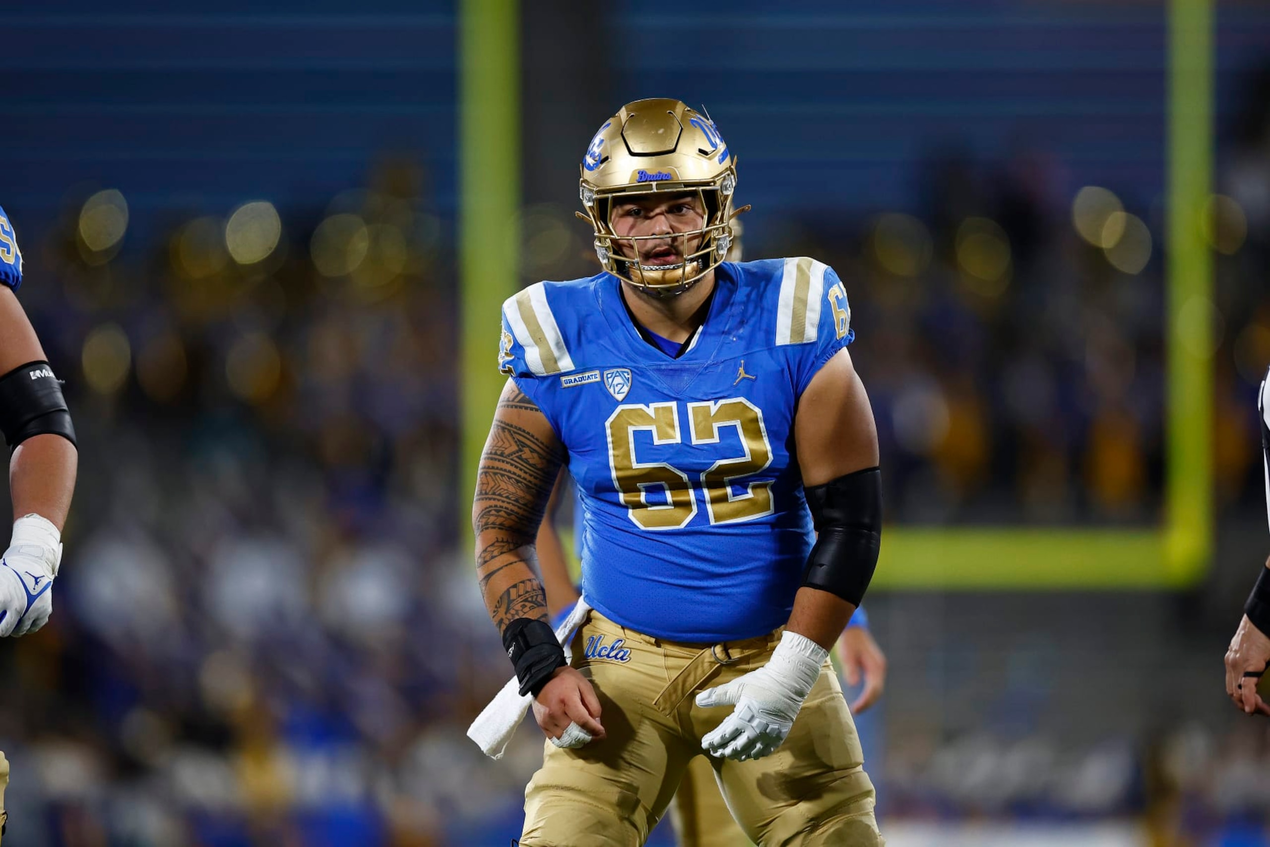 PASADENA, CALIFORNIA - NOVEMBER 11:   Duke Clemens #62 of the UCLA Bruins at Rose Bowl Stadium on November 11, 2023 in Pasadena, California. (Photo by Ronald Martinez/Getty Images)