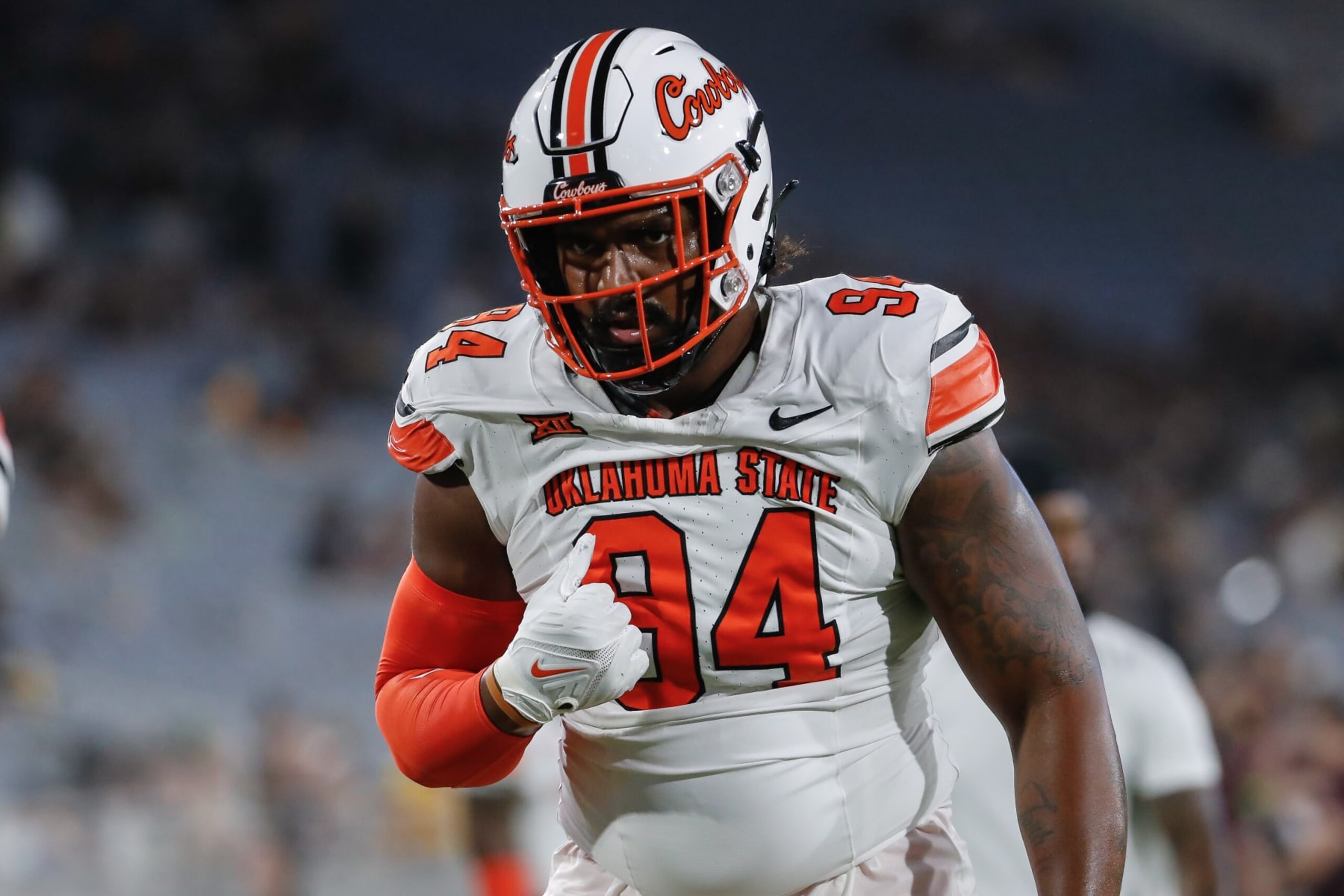 TEMPE, AZ - SEPTEMBER 09:  Oklahoma State Cowboys defensive end Anthony Goodlow (94) looks on before the college football game between the Oklahoma State Cowboys and the Arizona State Sun Devils on September 9, 2023 at Mountain America Stadium in Tempe, Arizona. (Photo by Kevin Abele/Icon Sportswire via Getty Images)