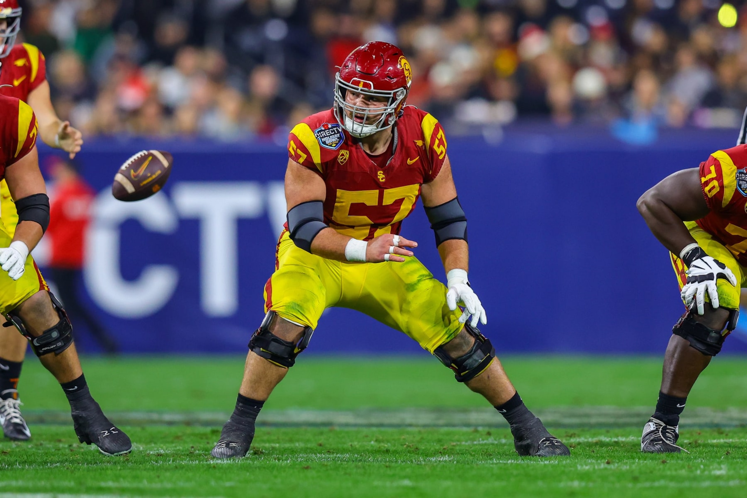 SAN DIEGO, CA - DECEMBER 27: USC Trojans offensive lineman Justin Dedich (57) blocks during the Directv Holiday Bowl football game between the Louisville Cardinals and the USC Trojans on December 27, 2023, at Petco Park in San Diego, CA. (Photo by Jordon Kelly/Icon Sportswire via Getty Images)