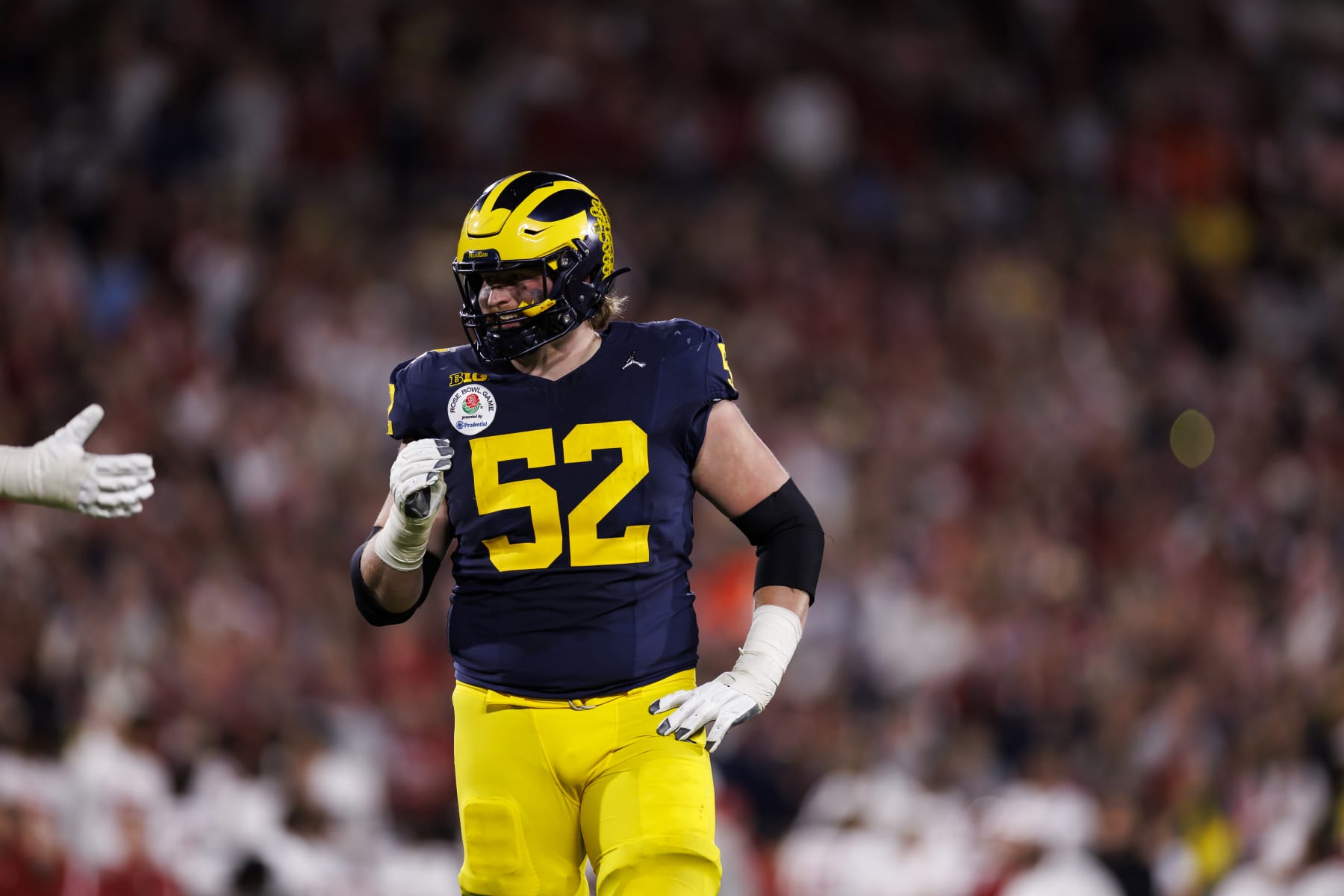 PASADENA, CALIFORNIA - JANUARY 01: Offensive lineman Karsen Barnhart #52 of the Michigan Wolverines looks on during the CFP Semifinal Rose Bowl Game against the Alabama Crimson Tide at Rose Bowl Stadium on January 1, 2024 in Pasadena, California. (Photo by Ryan Kang/Getty Images)