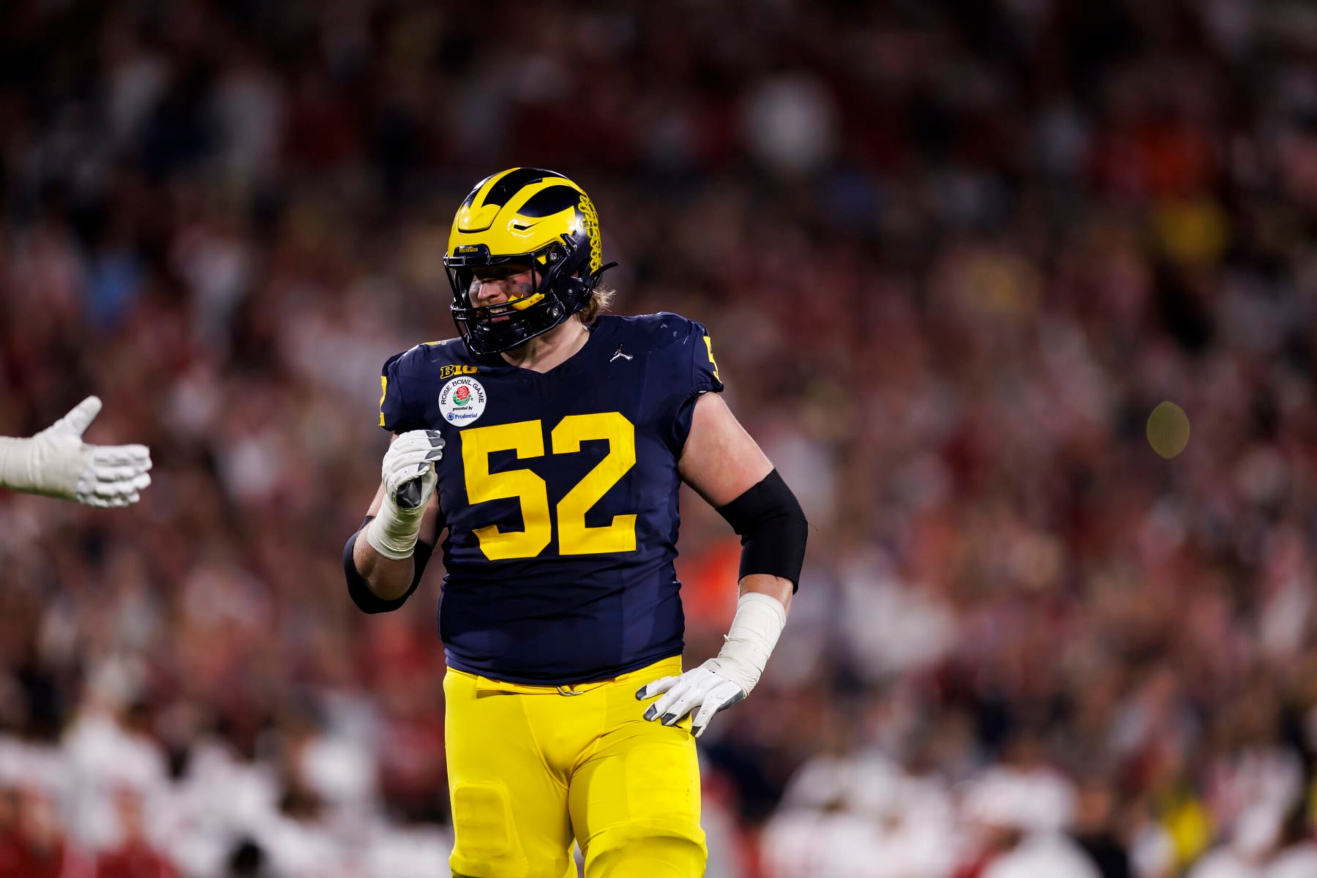 PASADENA, CALIFORNIA - JANUARY 01: Offensive lineman Karsen Barnhart #52 of the Michigan Wolverines looks on during the CFP Semifinal Rose Bowl Game against the Alabama Crimson Tide at Rose Bowl Stadium on January 1, 2024 in Pasadena, California. (Photo by Ryan Kang/Getty Images)